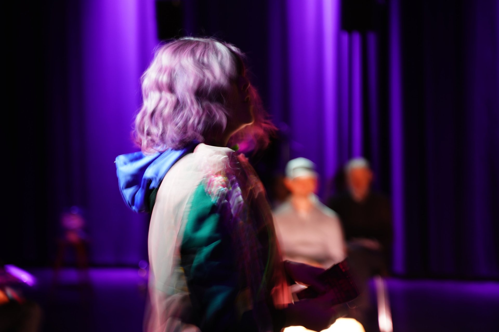 woman wearing yellow long-sleeved dress under white clouds and blue sky during daytime
