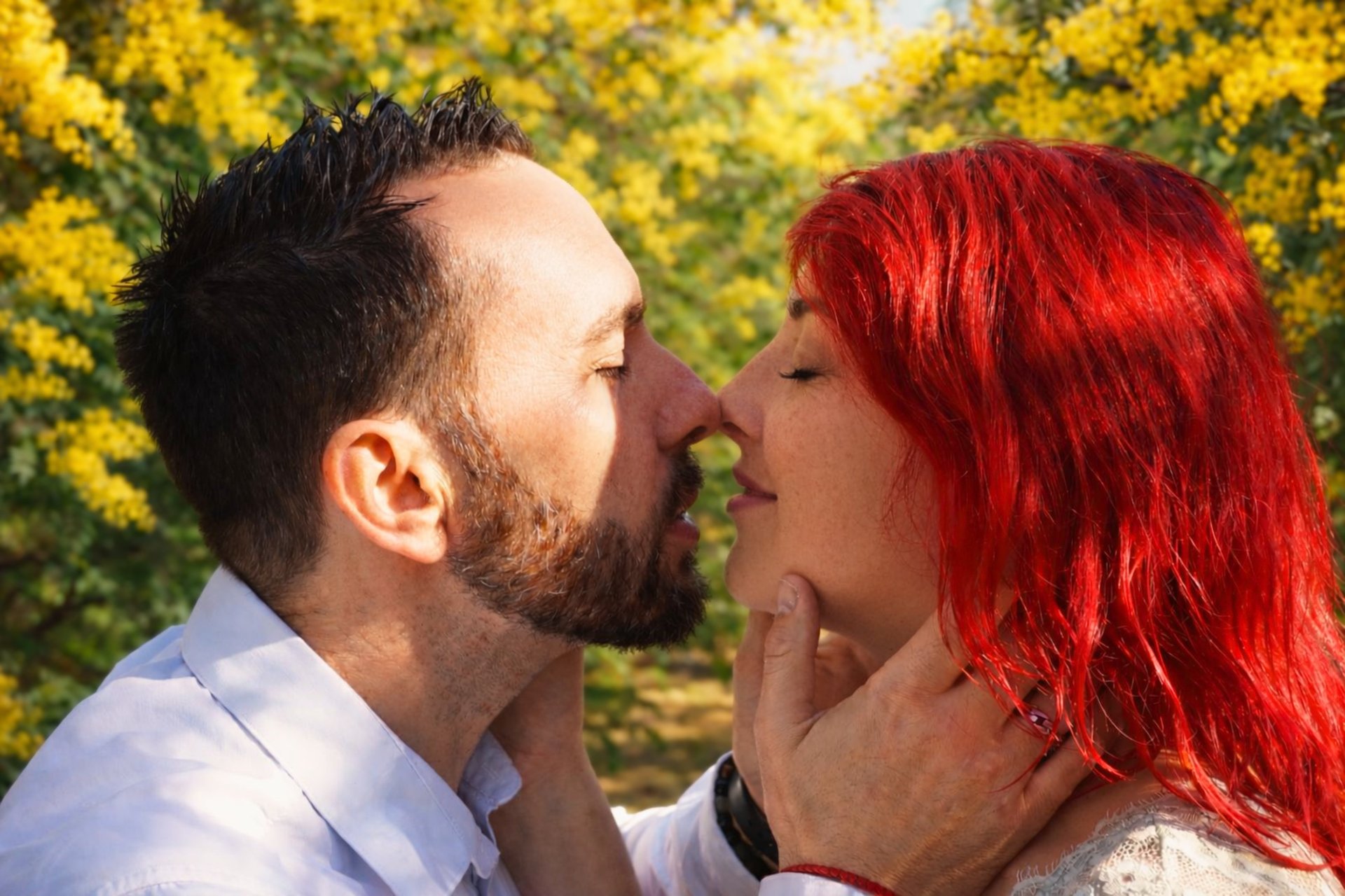 couple wearing silver-colored rings