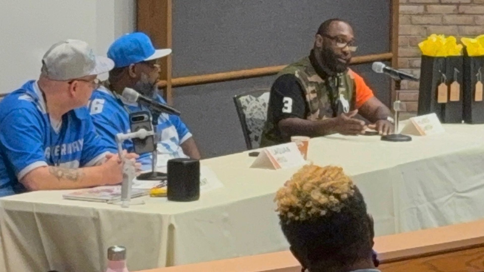 black and brown leather padded tub sofa