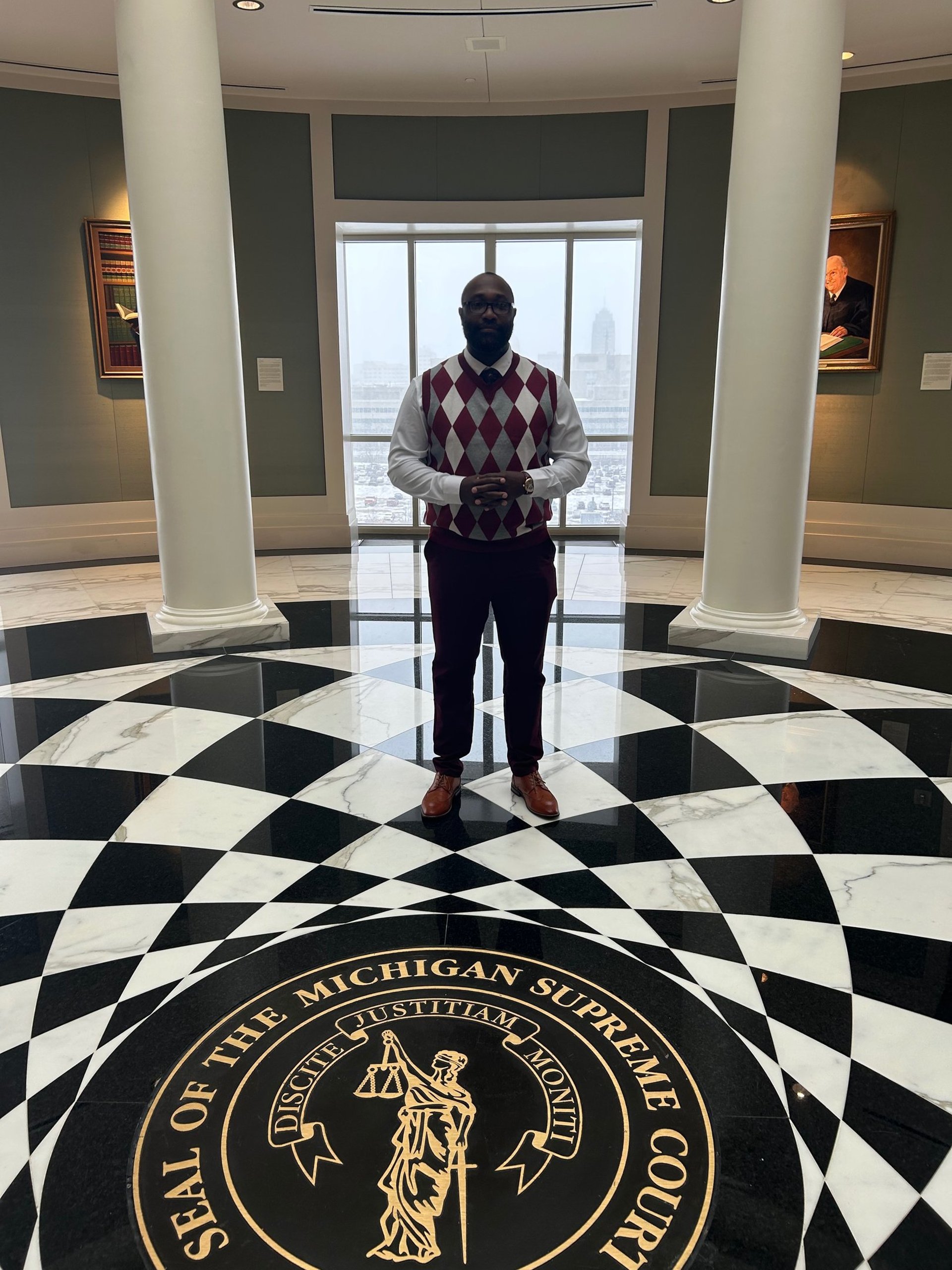 black and brown leather padded tub sofa