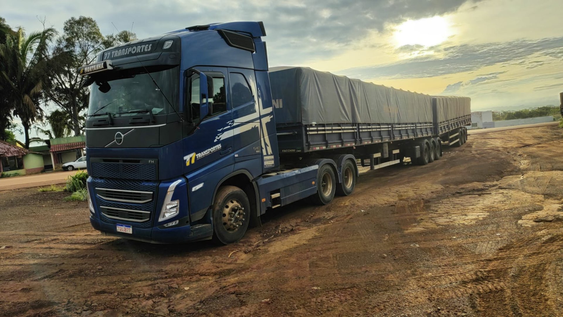 woman wearing yellow long-sleeved dress under white clouds and blue sky during daytime