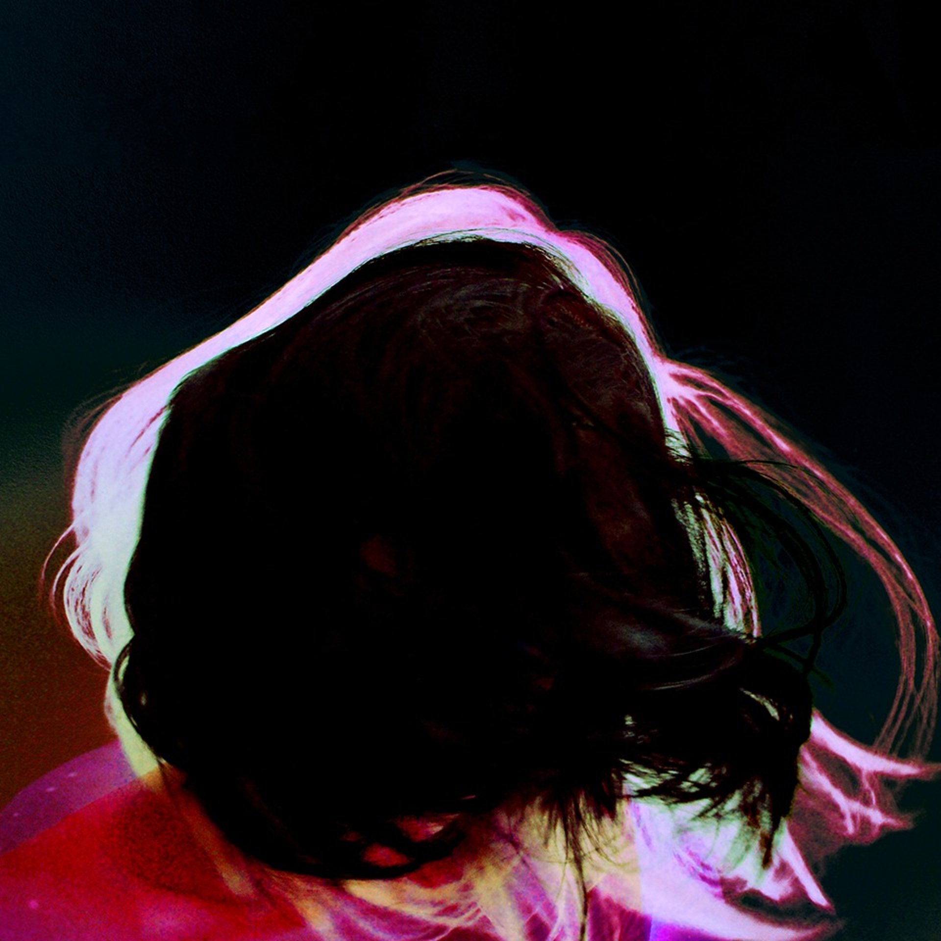 a close up of a black and brown abstract painting