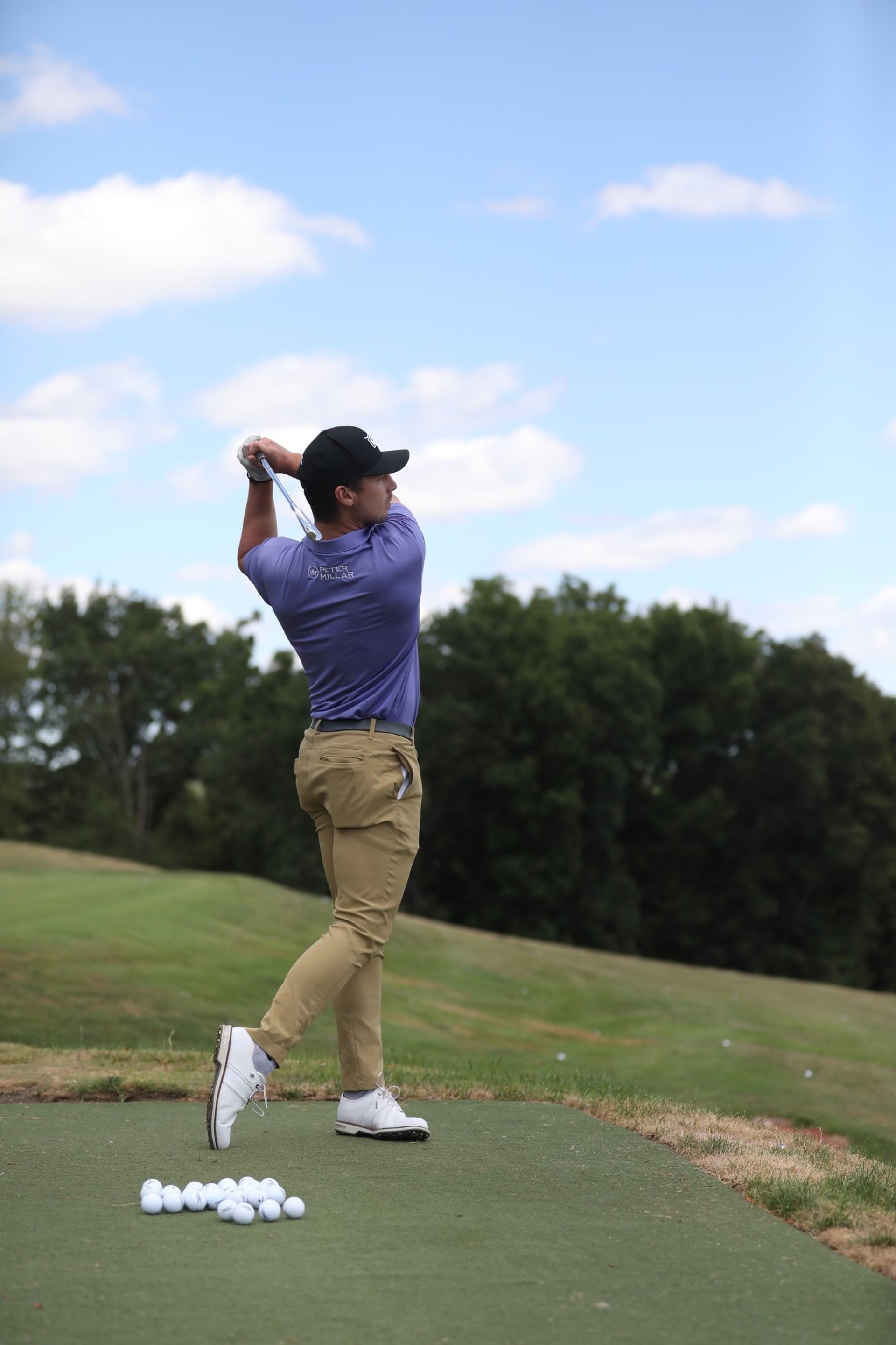 black and brown leather padded tub sofa