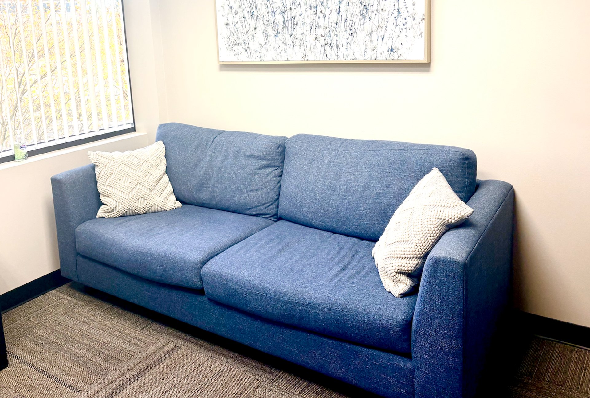 black and brown leather padded tub sofa