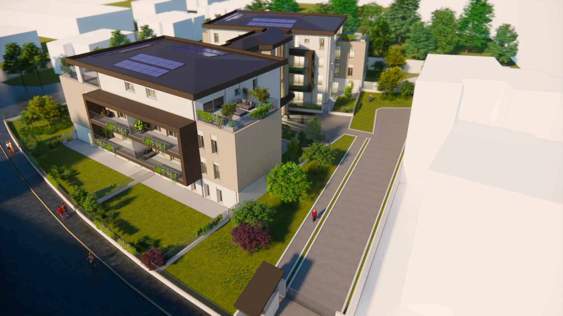 Vista aerea di Case Nove a Cremona: tetti con pannelli fotovoltaici, ampi terrazzi e integrazione nel verde urbano.