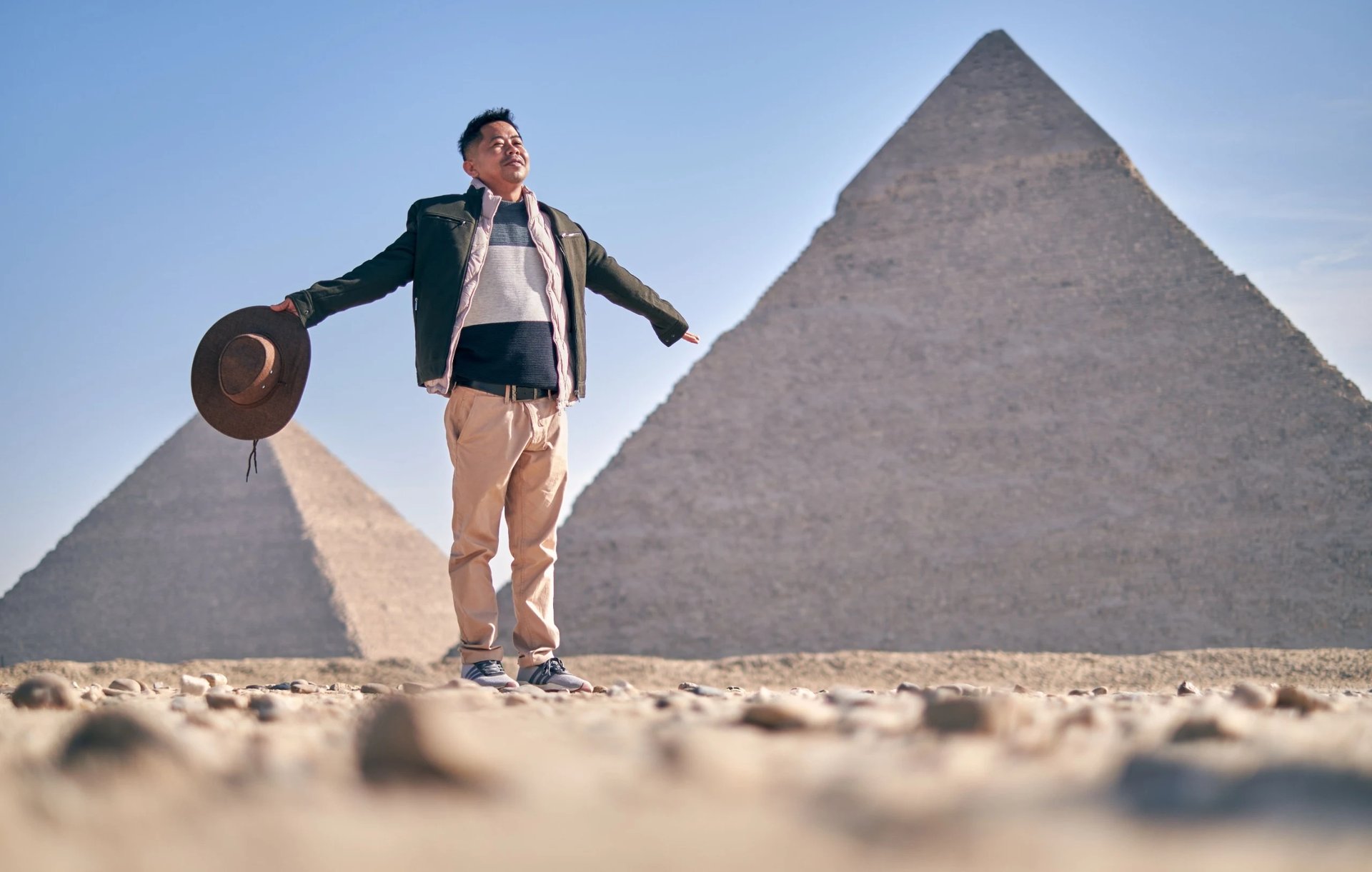 A body of water surrounded by palm trees