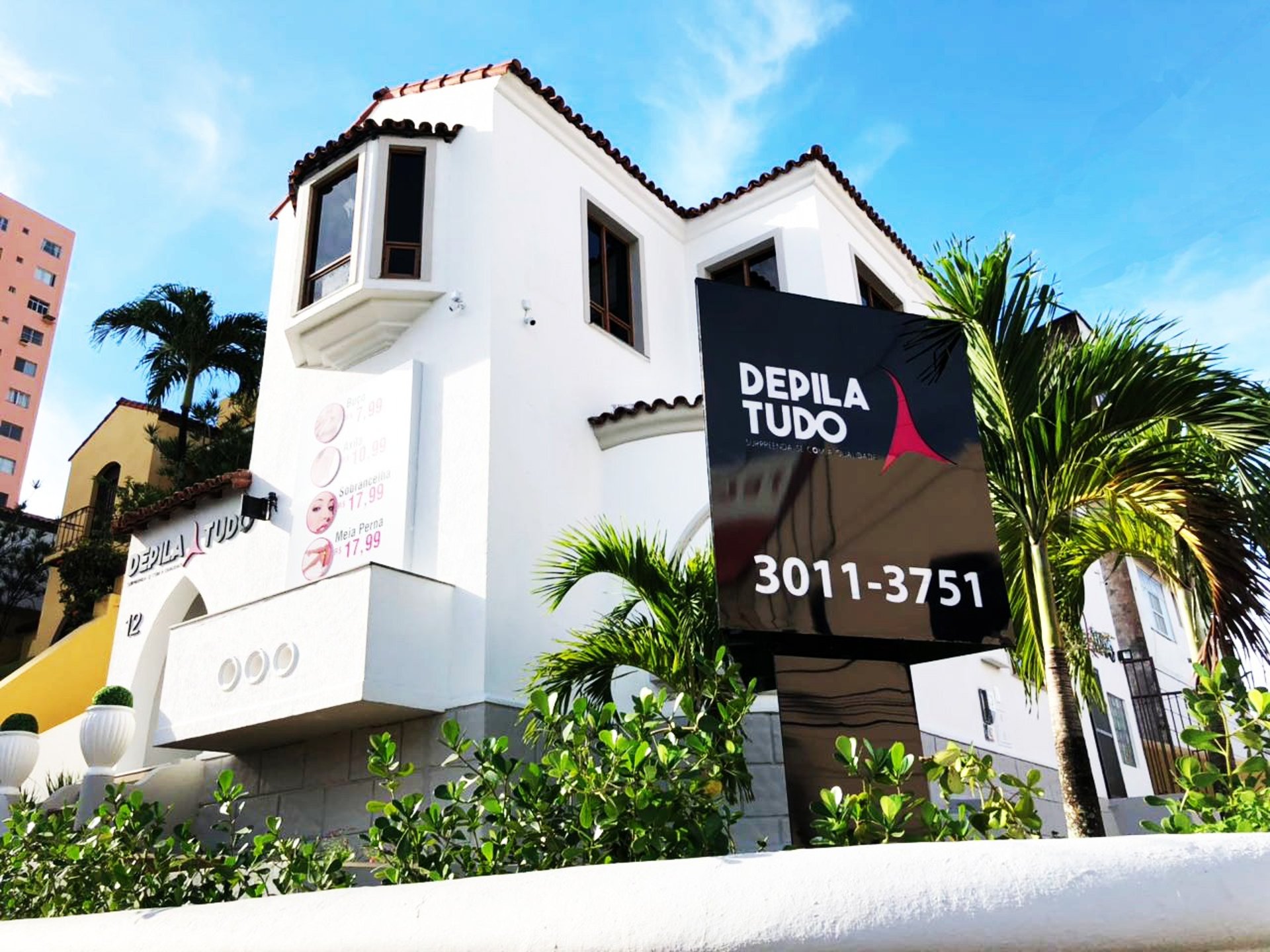 woman wearing yellow long-sleeved dress under white clouds and blue sky during daytime