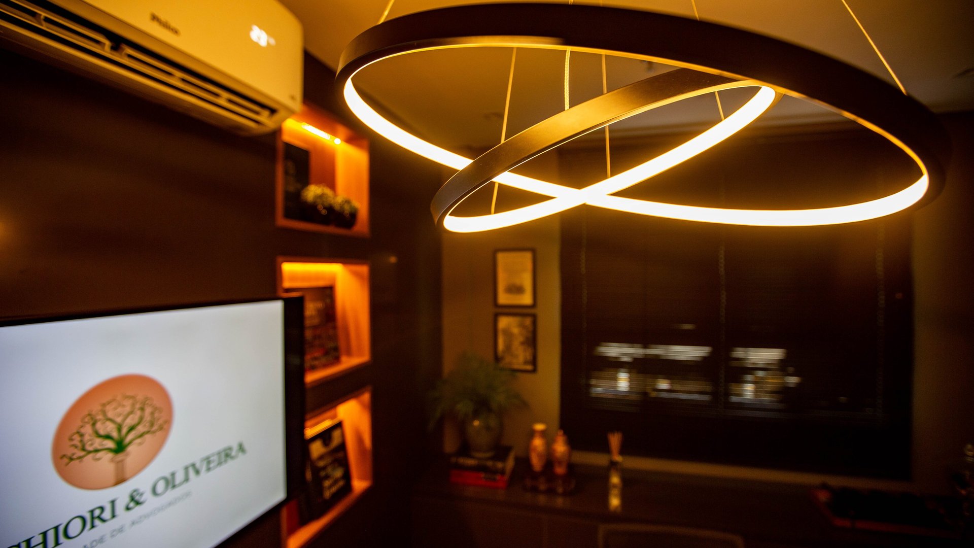 an abstract photo of a curved building with a blue sky in the background