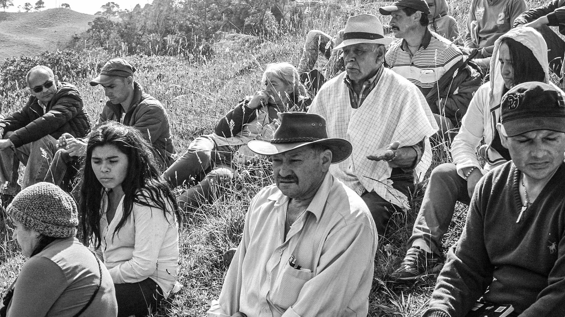 black and brown leather padded tub sofa