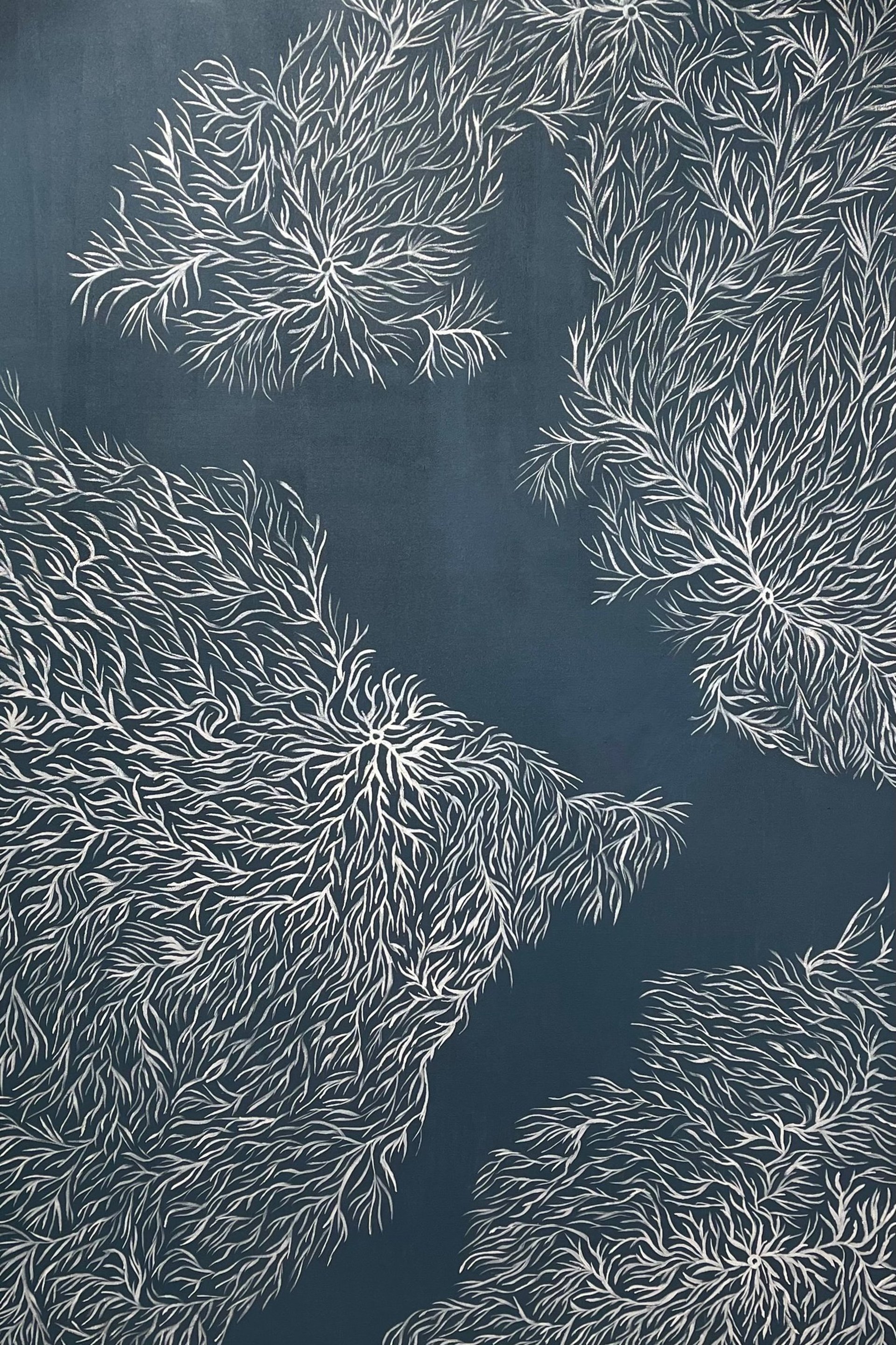 woman wearing yellow long-sleeved dress under white clouds and blue sky during daytime