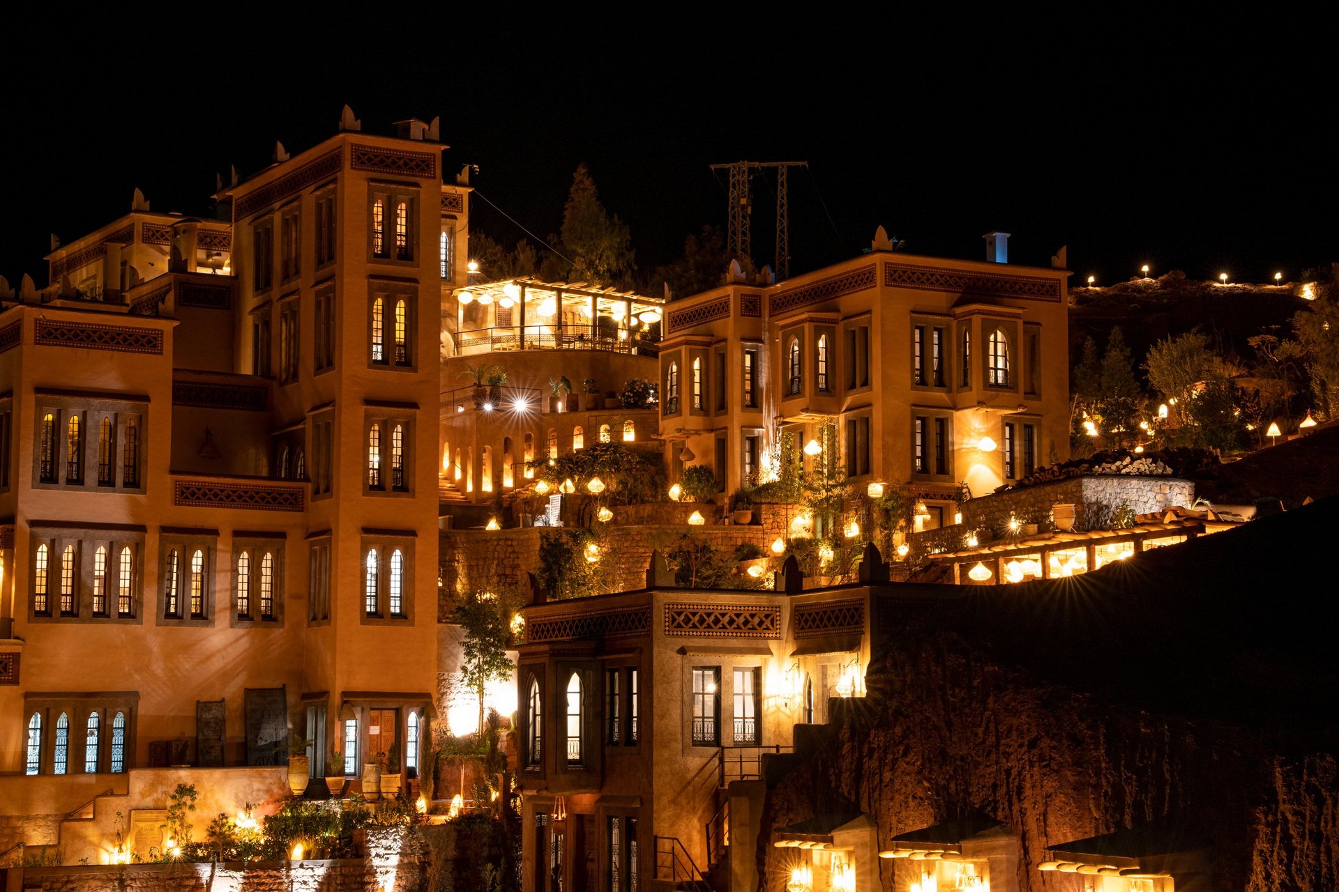 an abstract photo of a curved building with a blue sky in the background