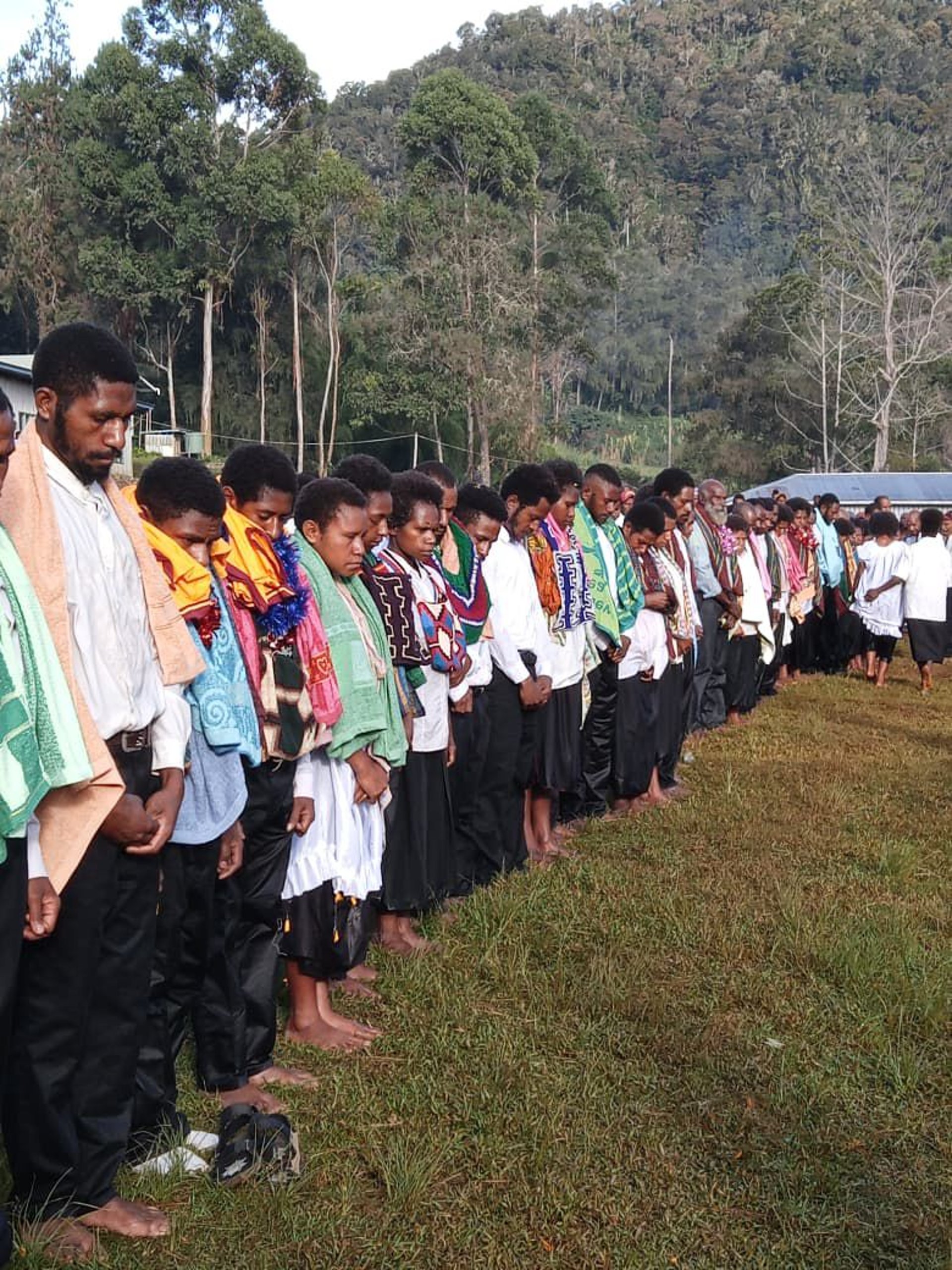 bible page on gray concrete surface