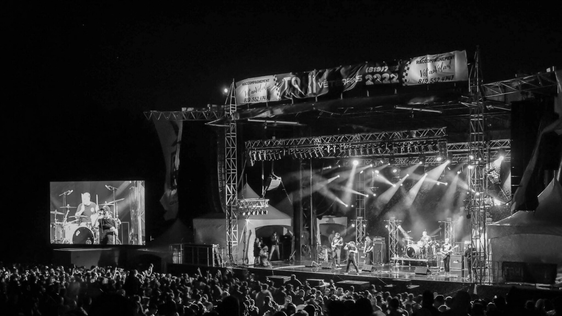an abstract photo of a curved building with a blue sky in the background