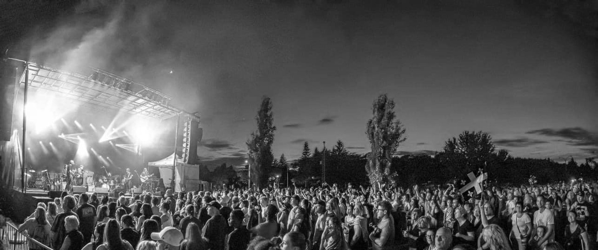 an abstract photo of a curved building with a blue sky in the background