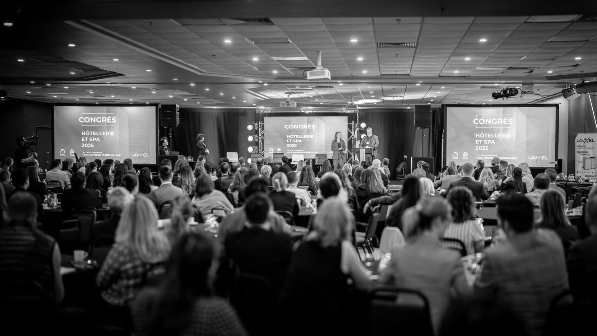 an abstract photo of a curved building with a blue sky in the background