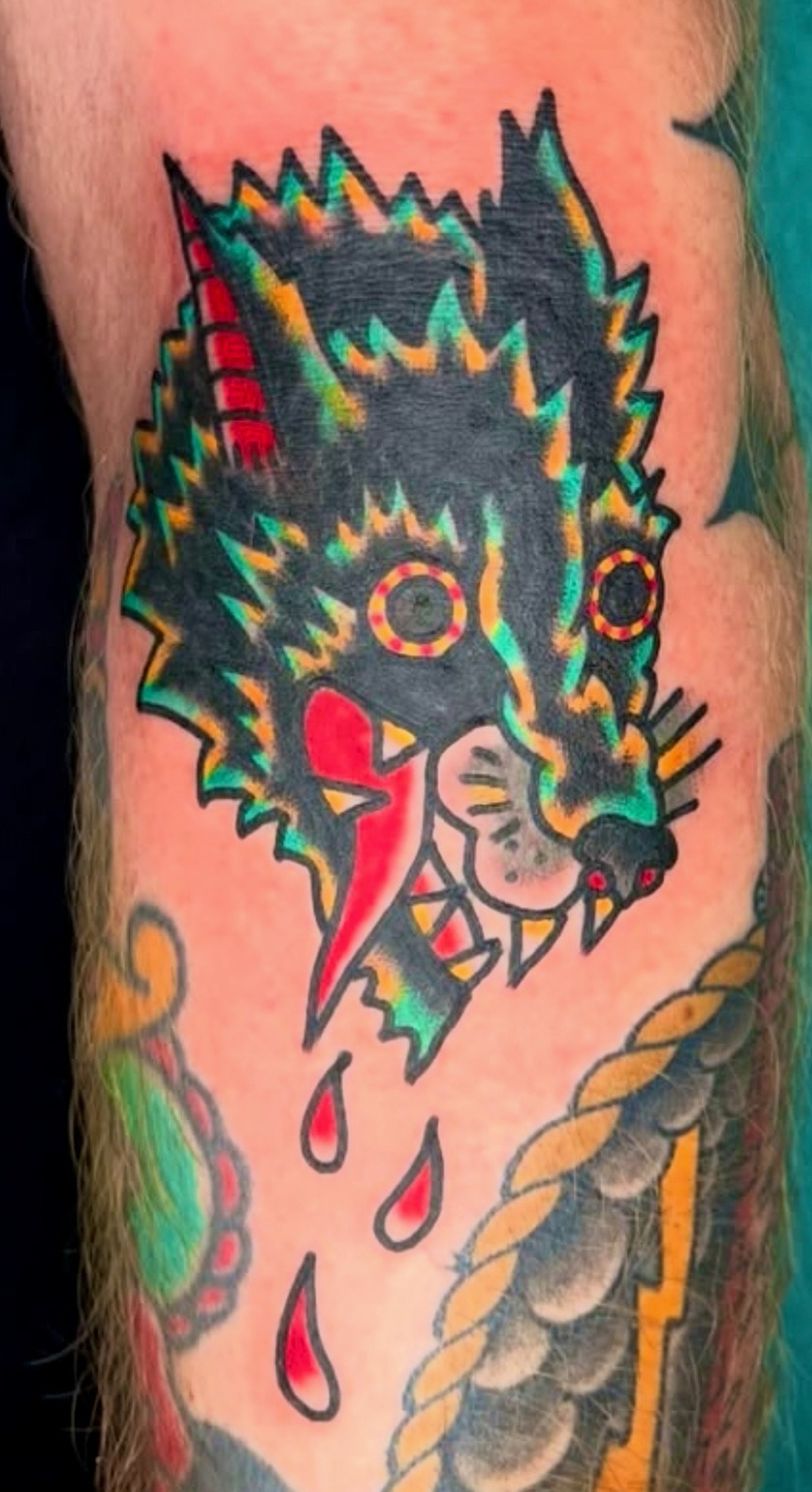 an abstract photo of a curved building with a blue sky in the background