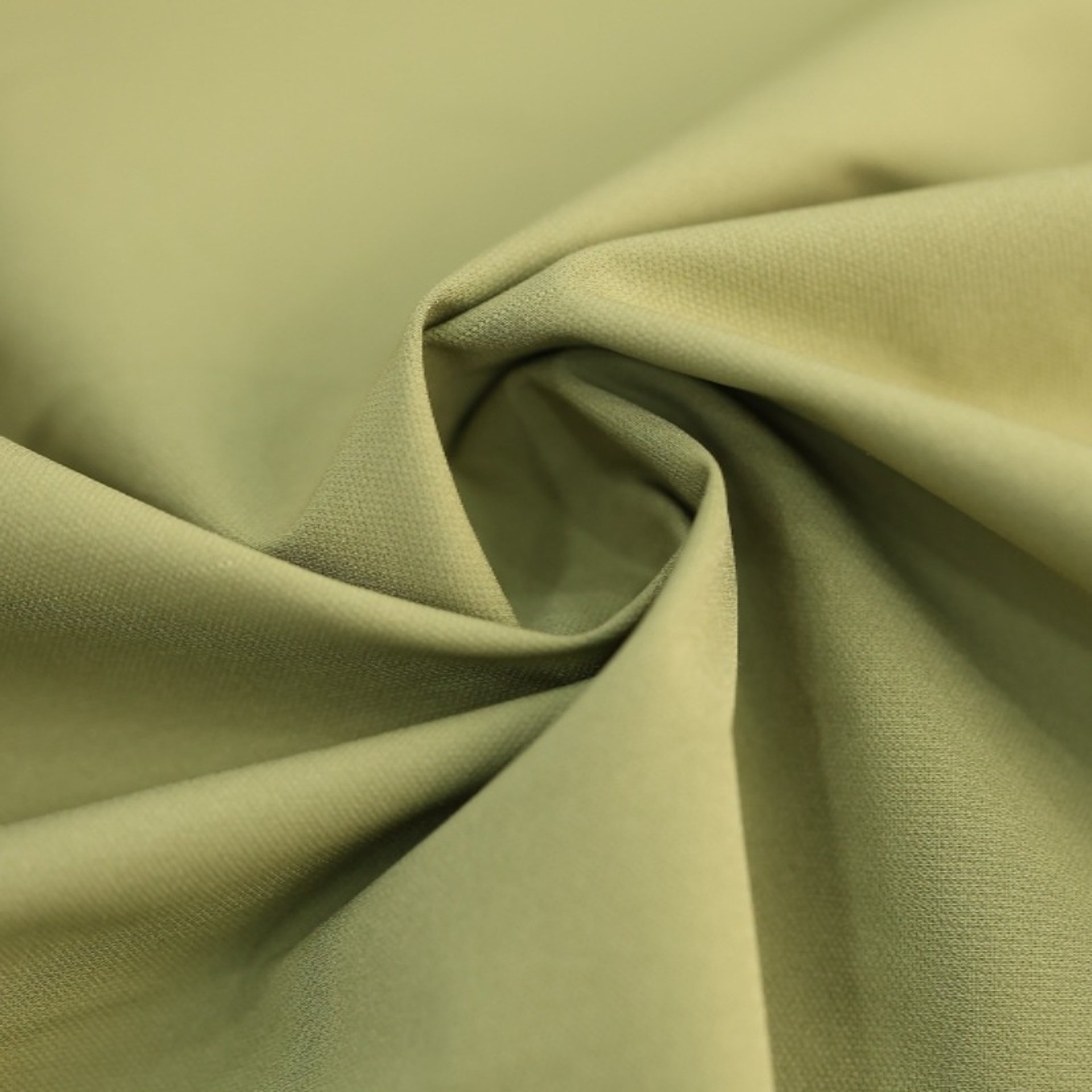 Woven fabric texture in green with smooth surface