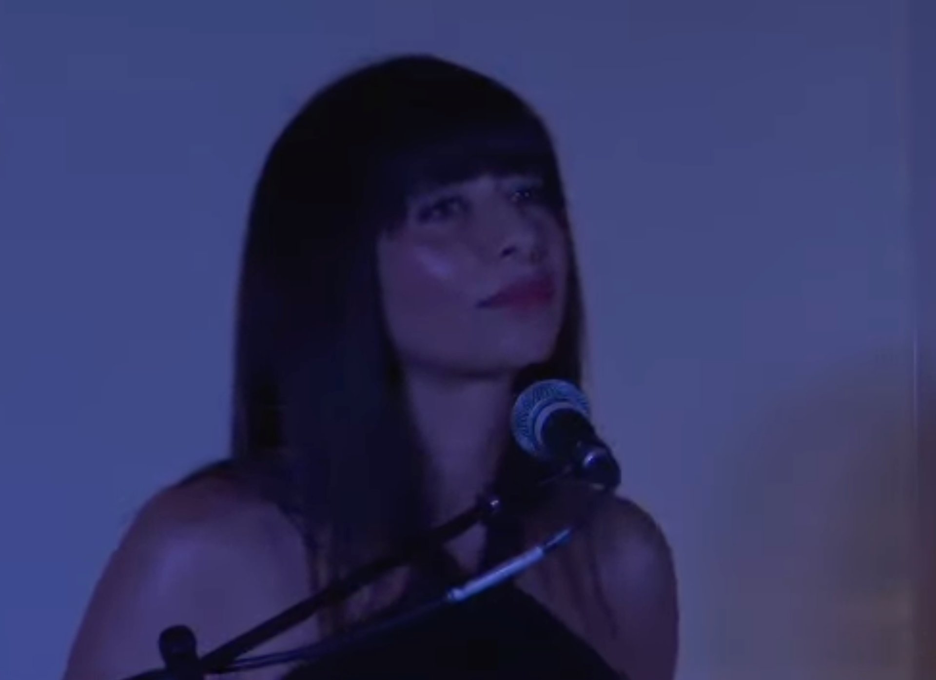 woman wearing yellow long-sleeved dress under white clouds and blue sky during daytime