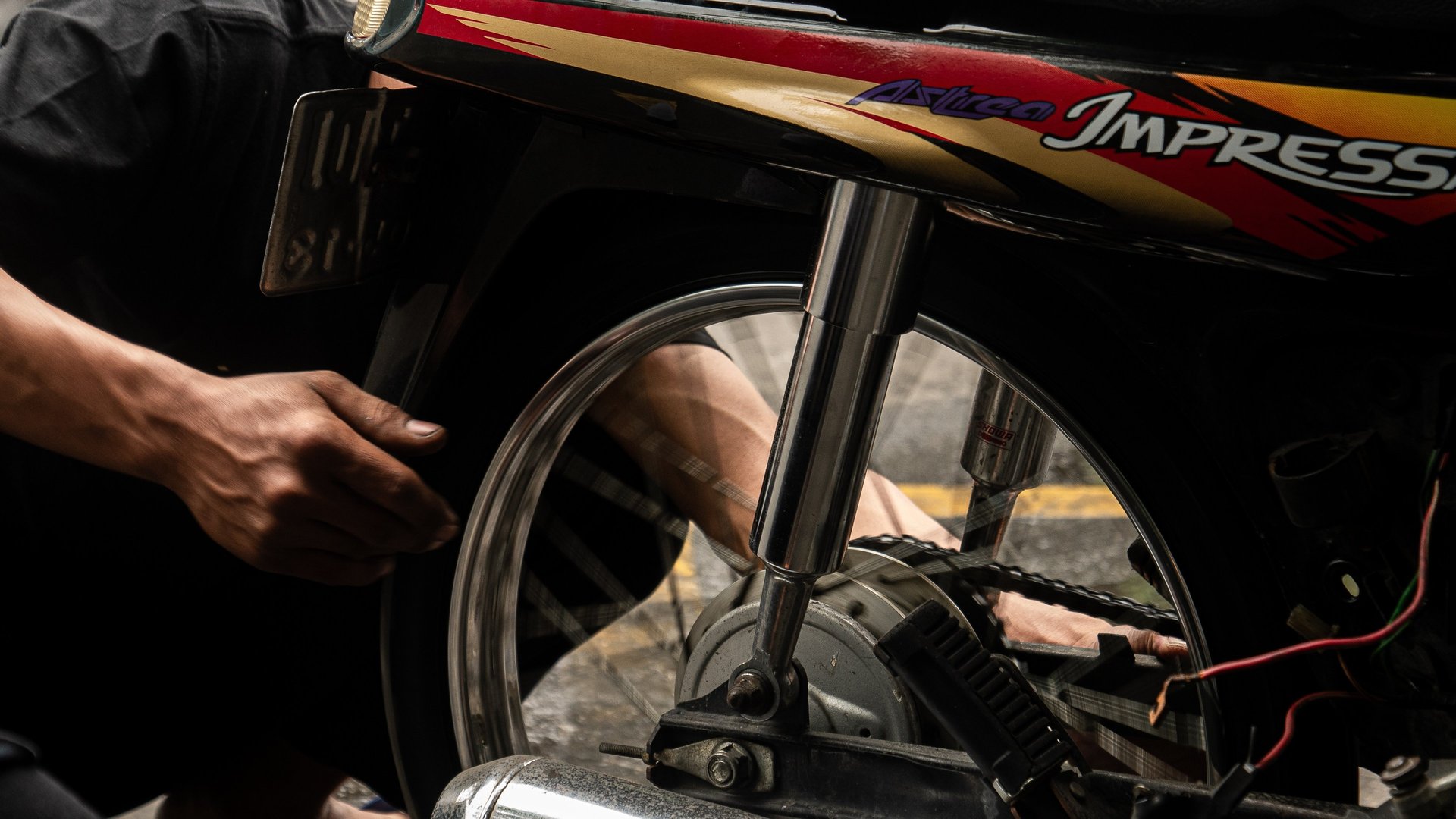 a close up of a black and brown abstract painting