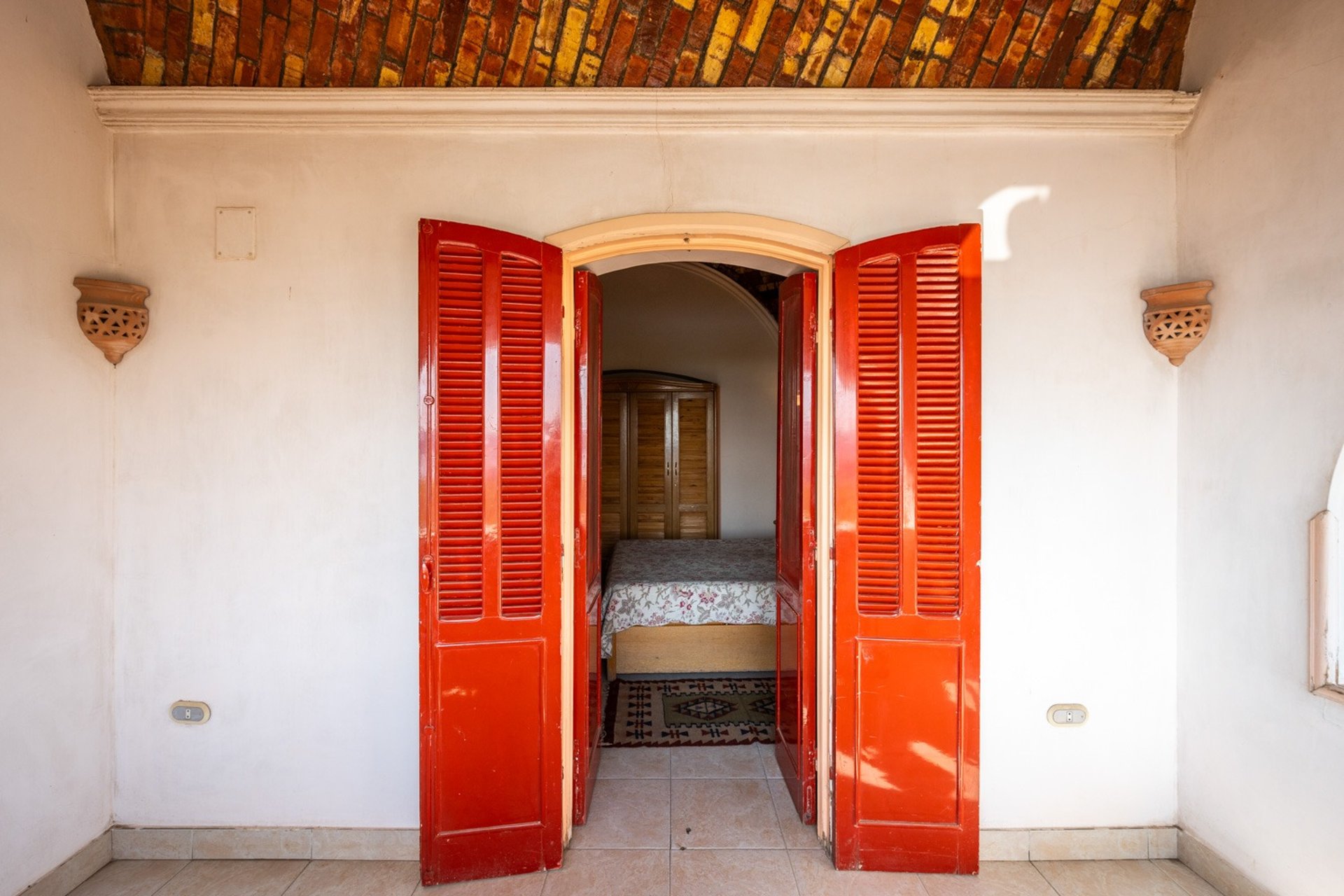 woman wearing yellow long-sleeved dress under white clouds and blue sky during daytime