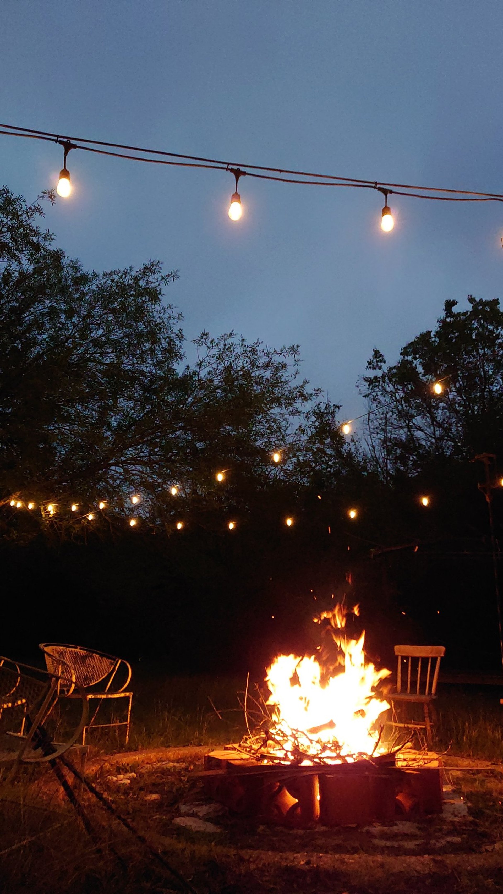 an abstract photo of a curved building with a blue sky in the background