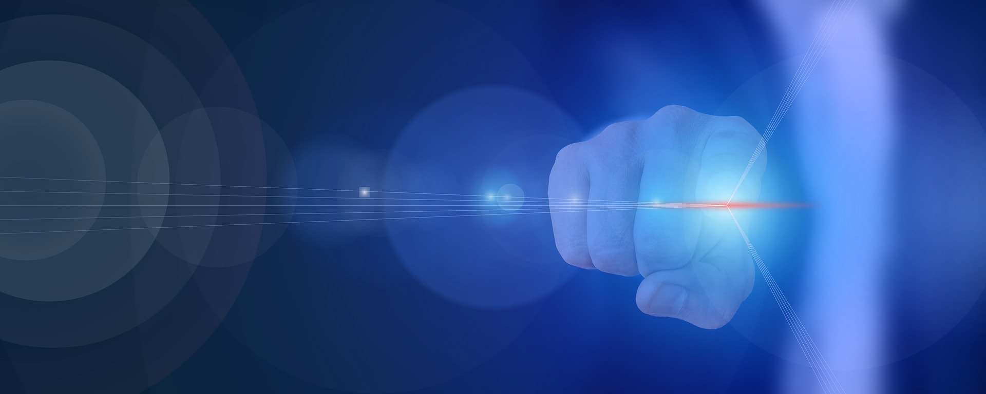 finger pointing forward with glow on its tip on blurred background