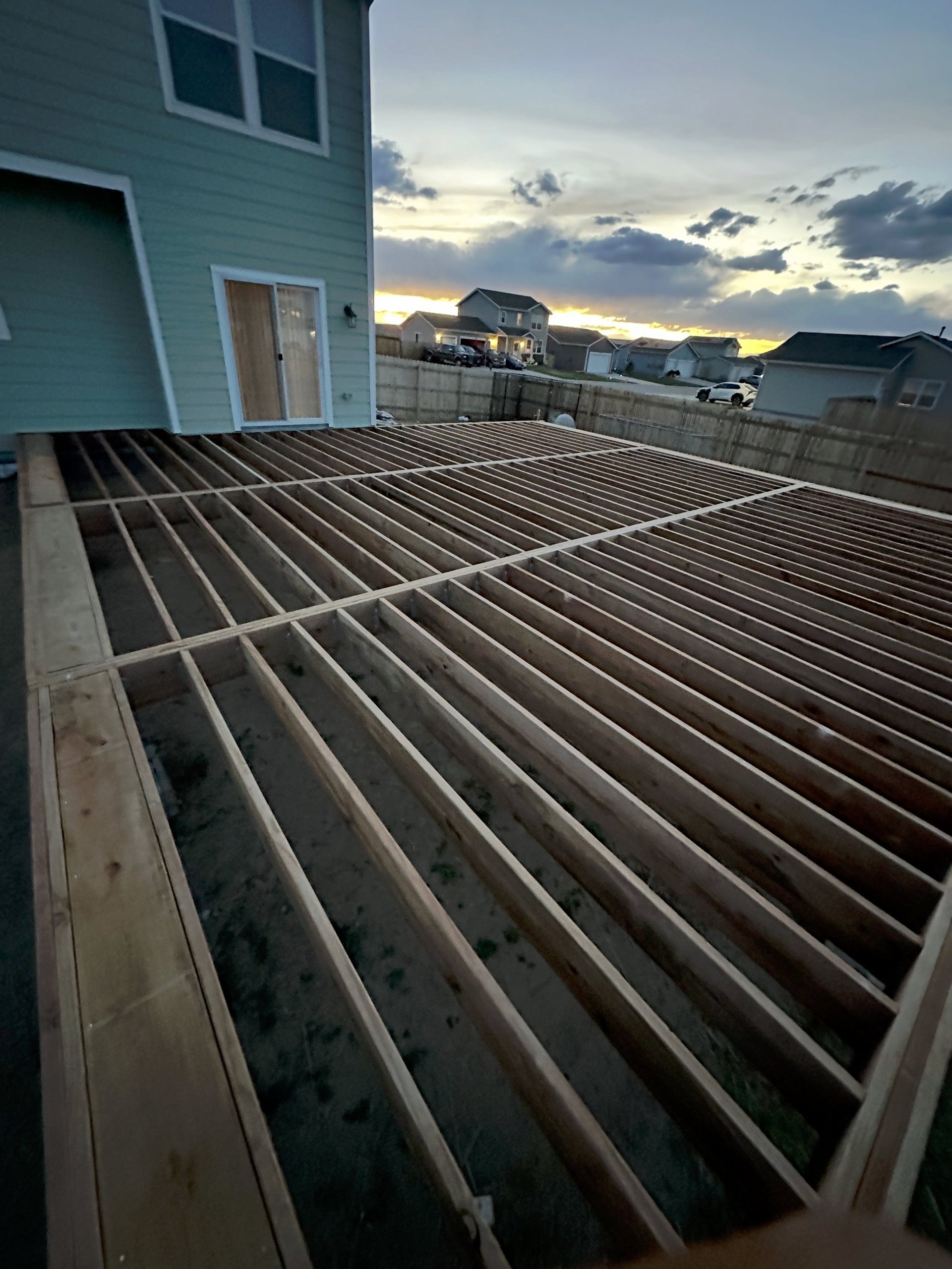 woman wearing yellow long-sleeved dress under white clouds and blue sky during daytime