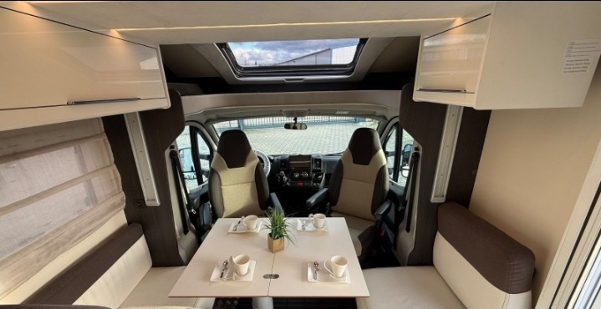 woman wearing yellow long-sleeved dress under white clouds and blue sky during daytime