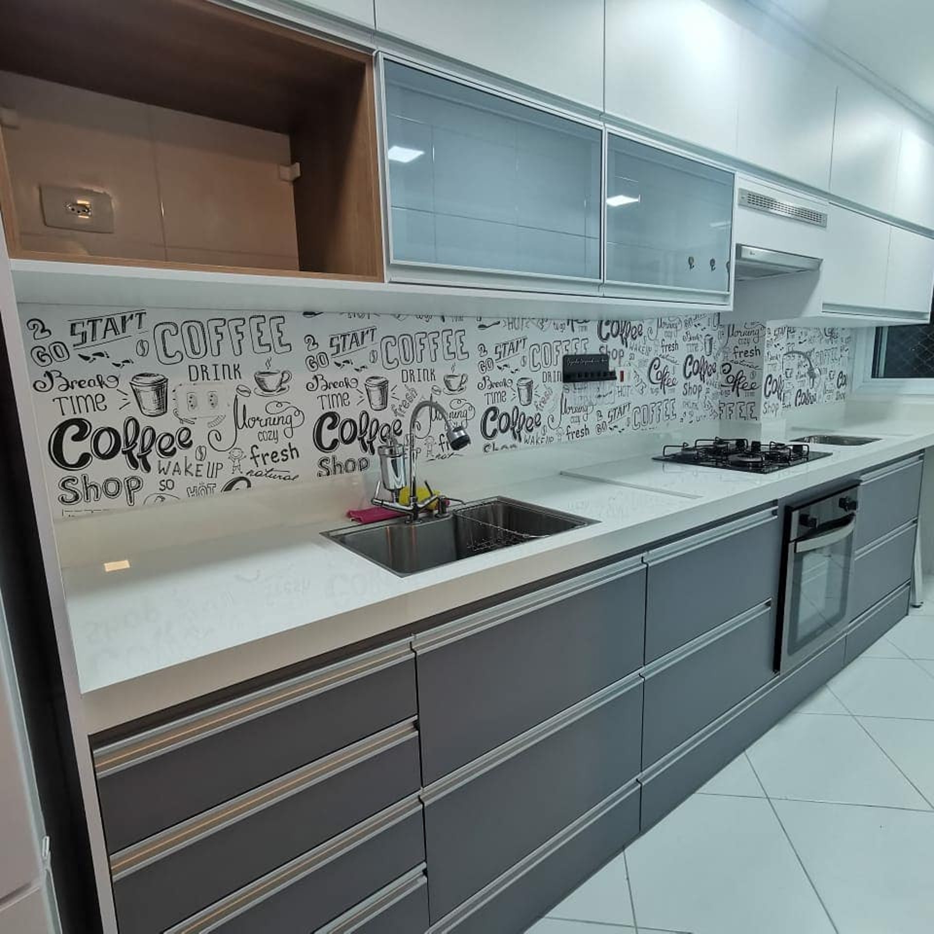 an abstract photo of a curved building with a blue sky in the background