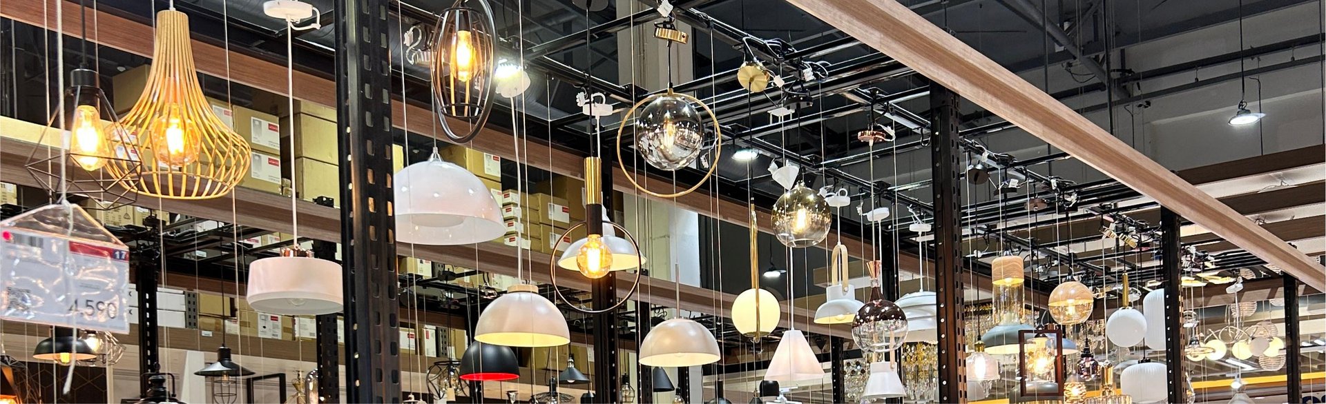 black and silver desk lamp on brown wooden table