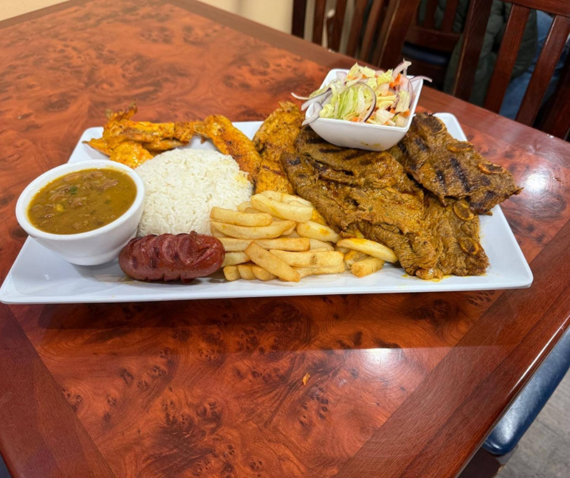 woman wearing yellow long-sleeved dress under white clouds and blue sky during daytime