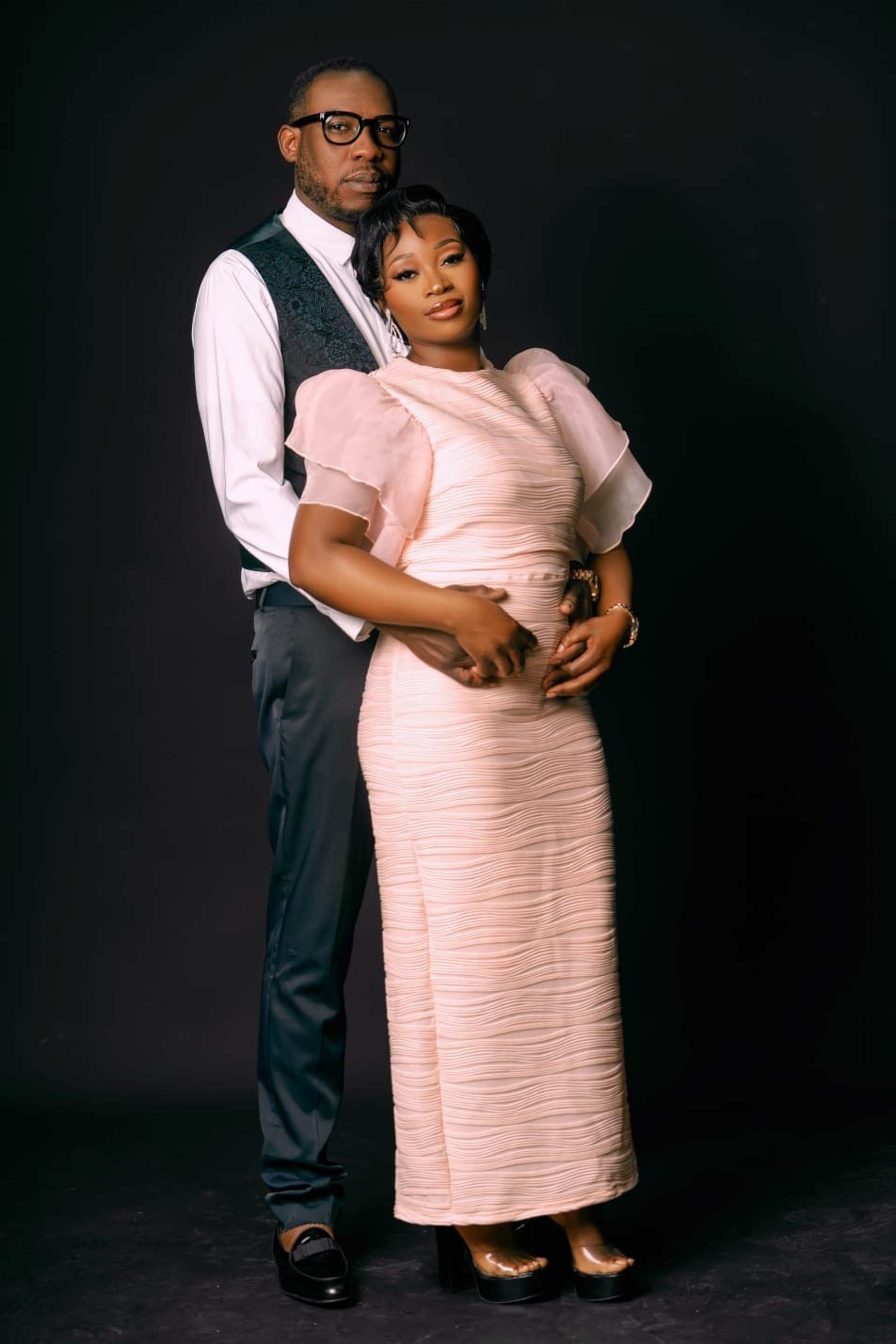 couple wearing silver-colored rings