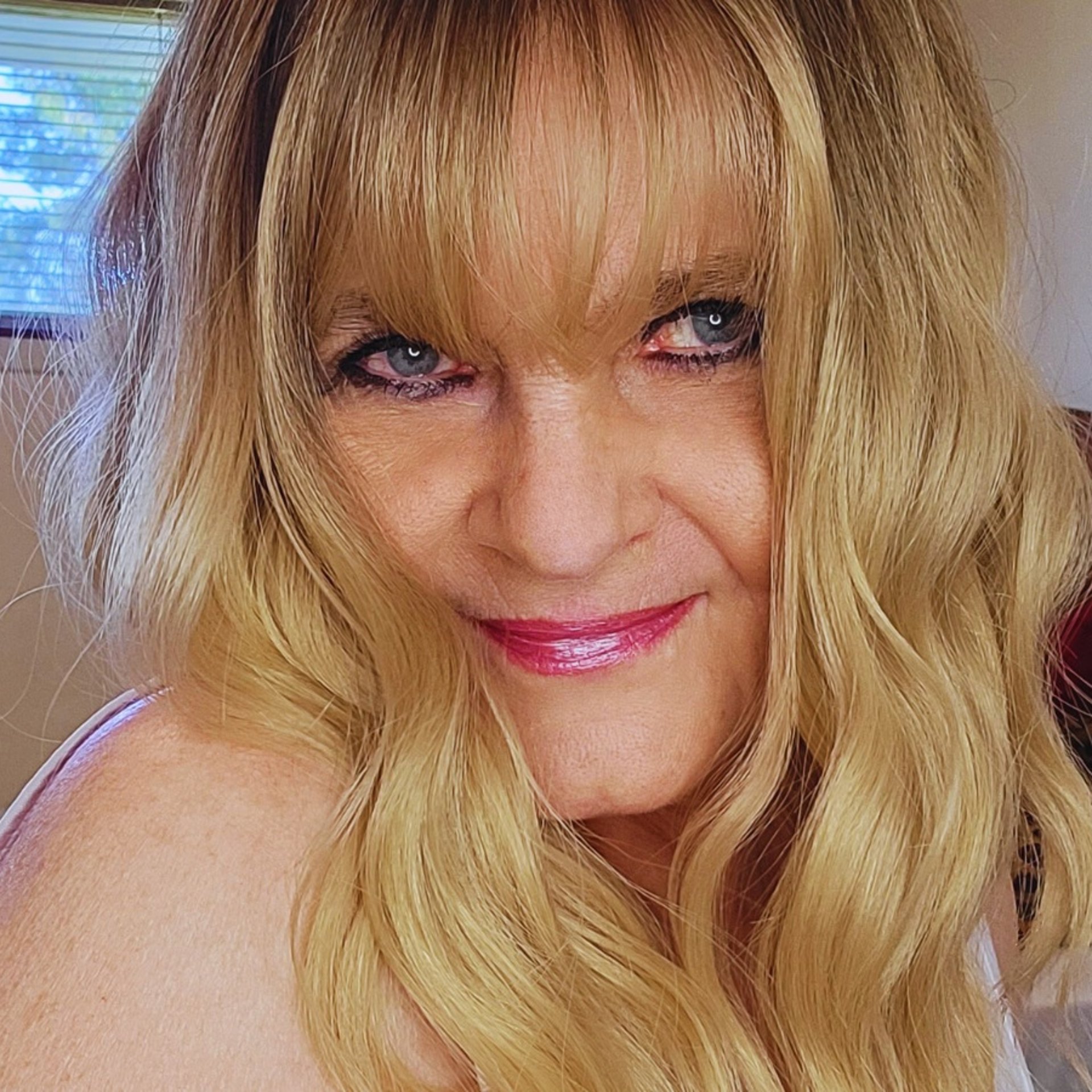 person wearing grey knit sweater