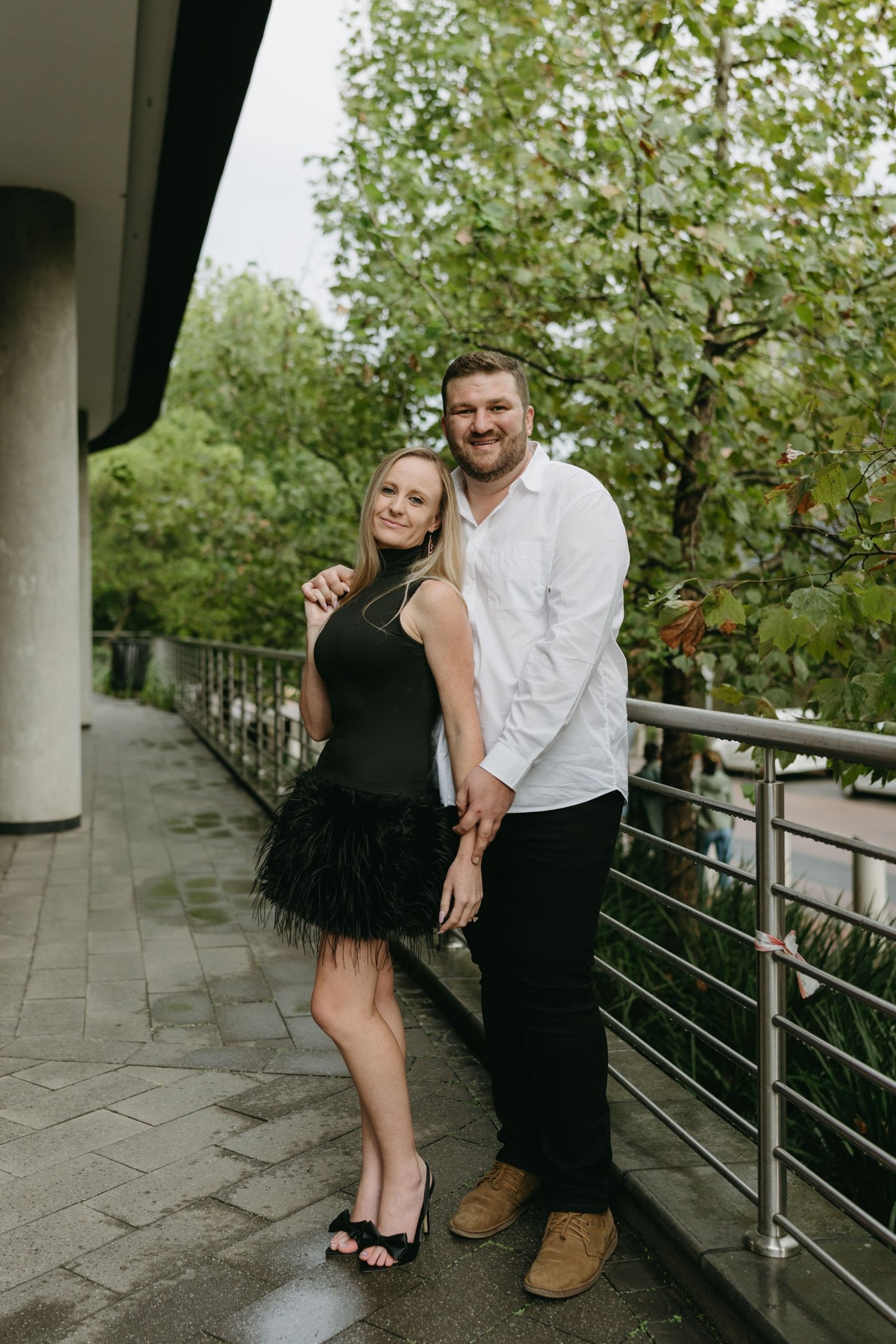 couple wearing silver-colored rings