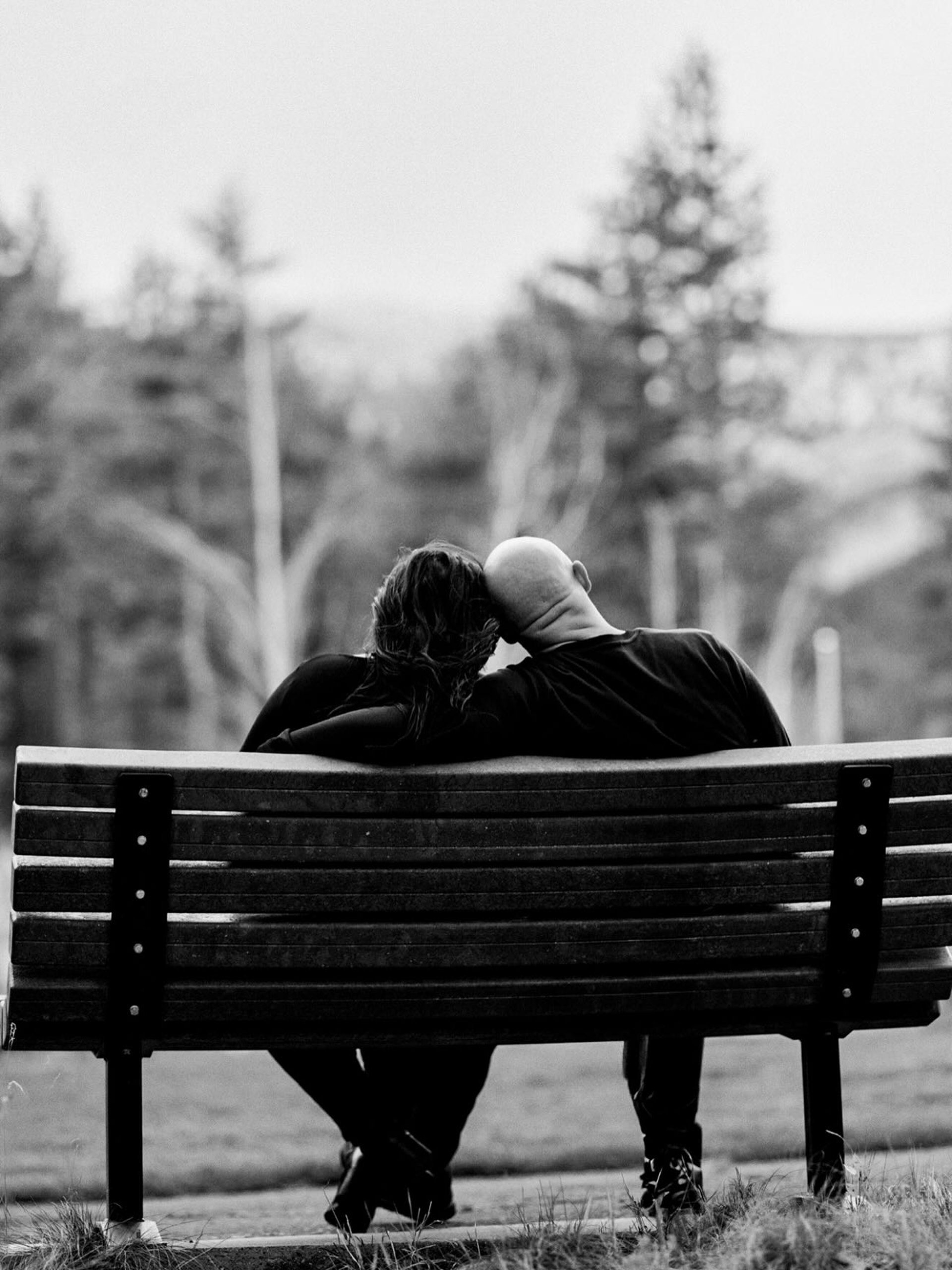 couple wearing silver-colored rings