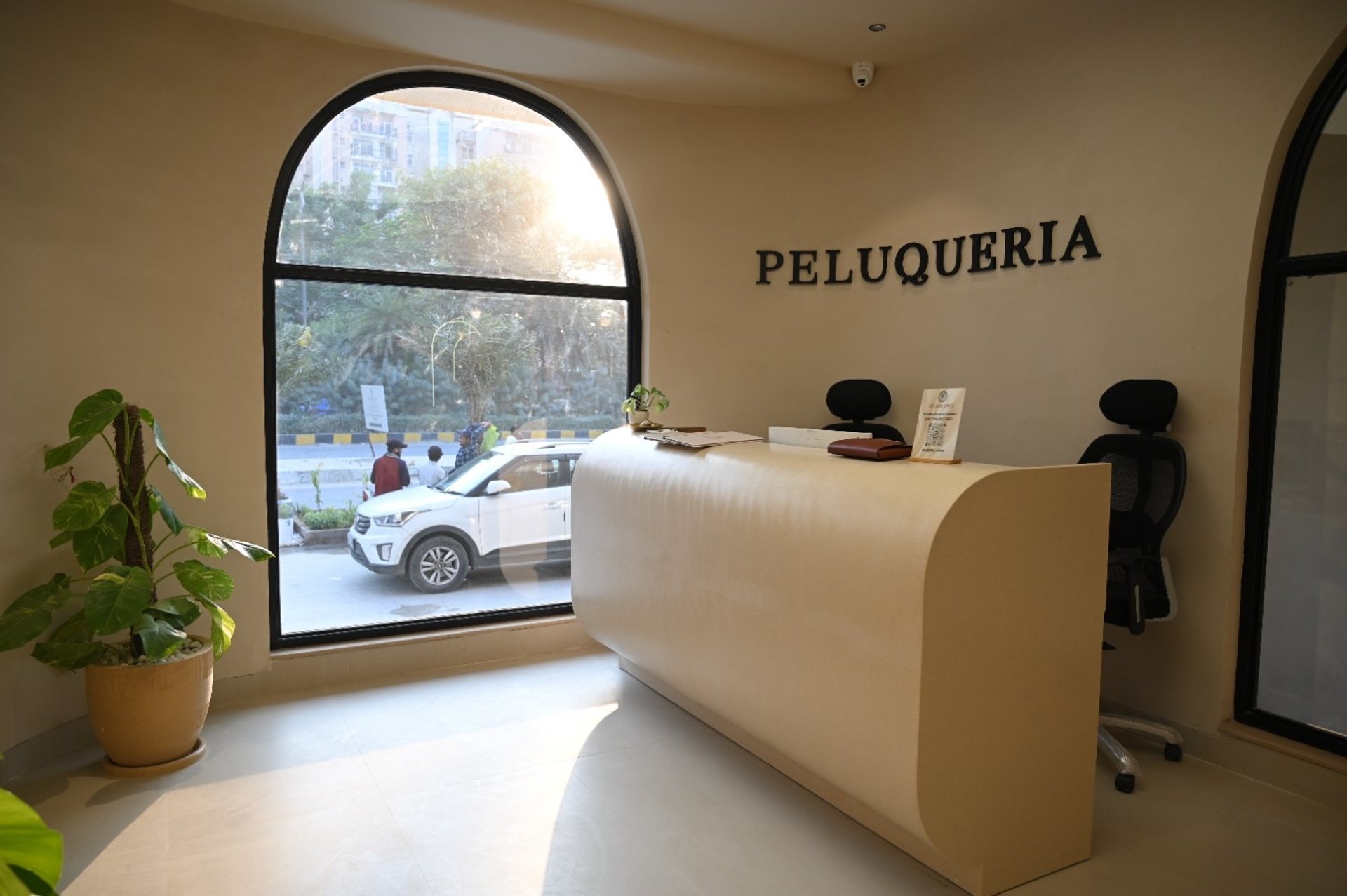 a room filled with furniture and a large window