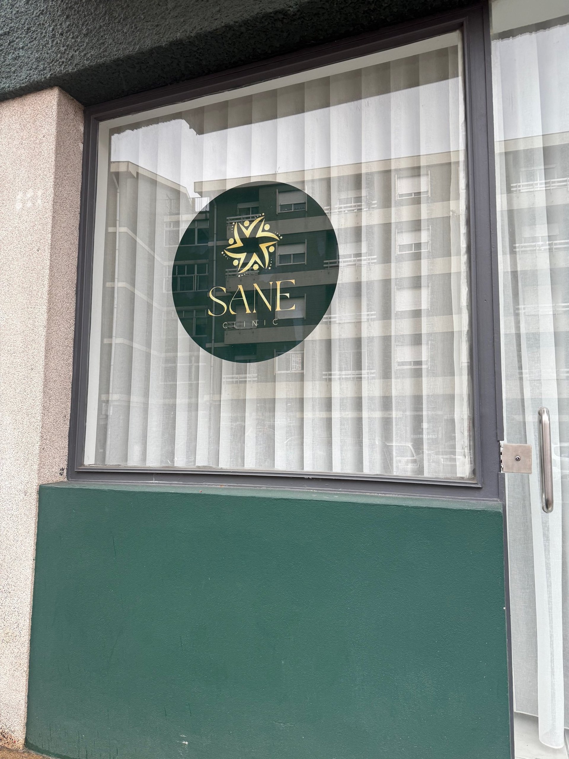 doctor holding red stethoscope