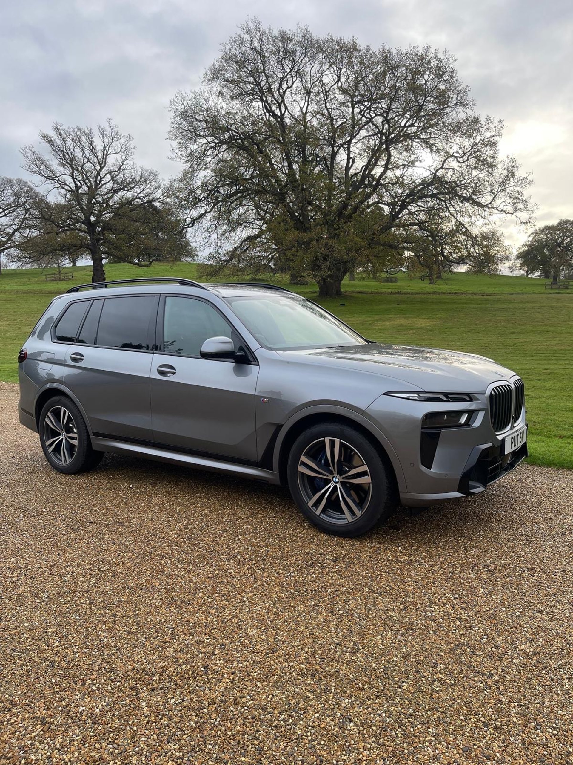 black and brown leather padded tub sofa
