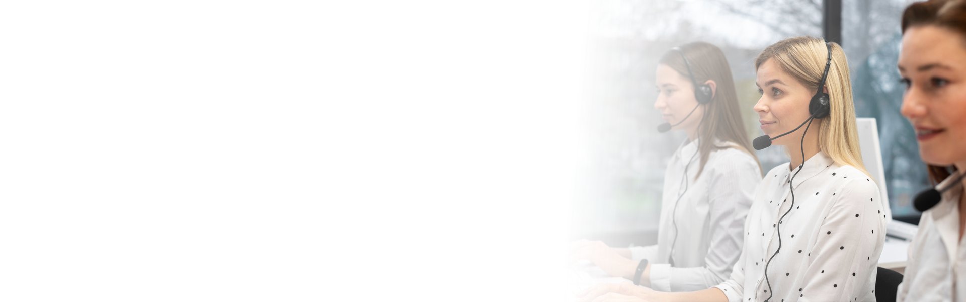 a black and white photo of a white wall