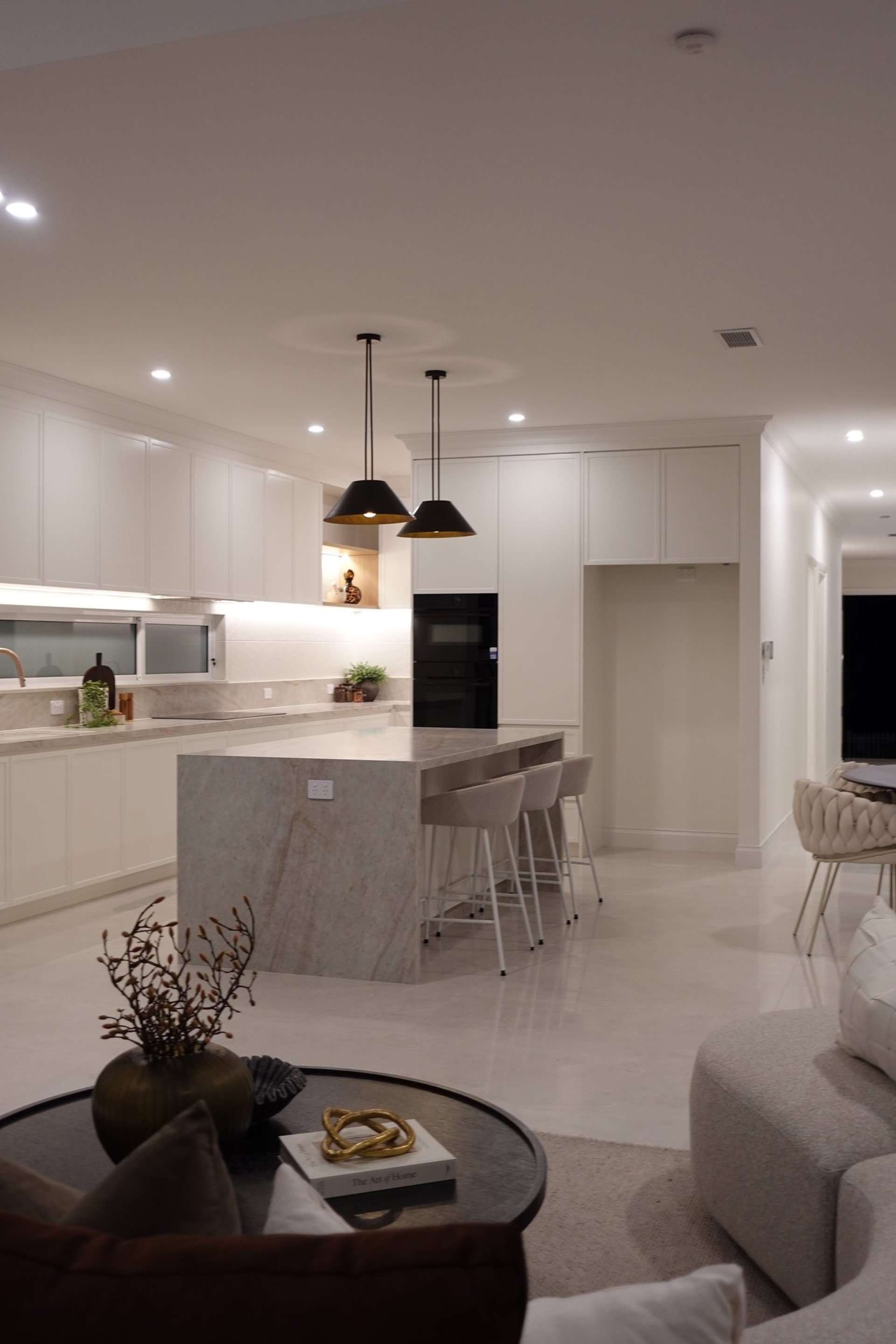 black and brown leather padded tub sofa
