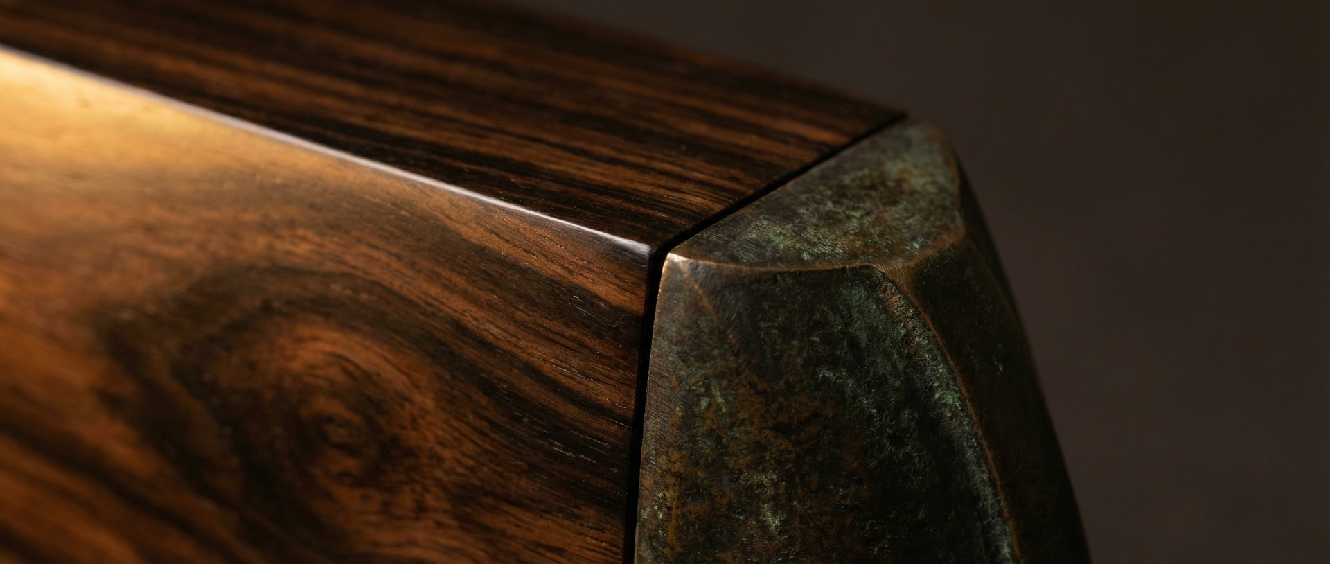 Detail of furniture junction, bronze and macassar