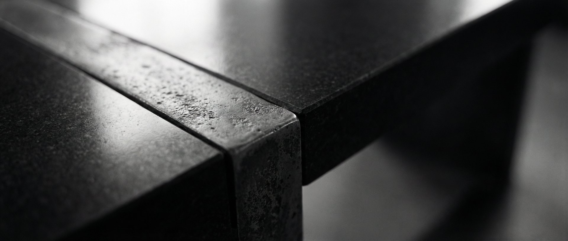 Close up of black marble and rough metal