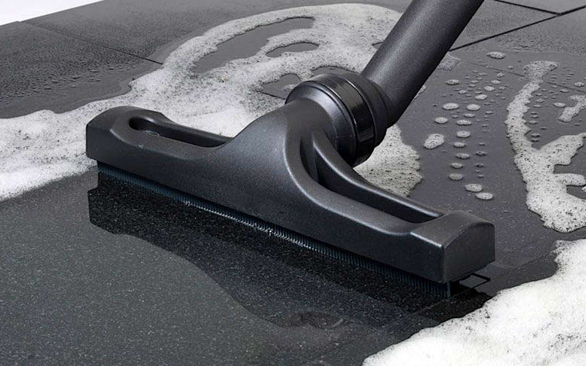 black and brown leather padded tub sofa