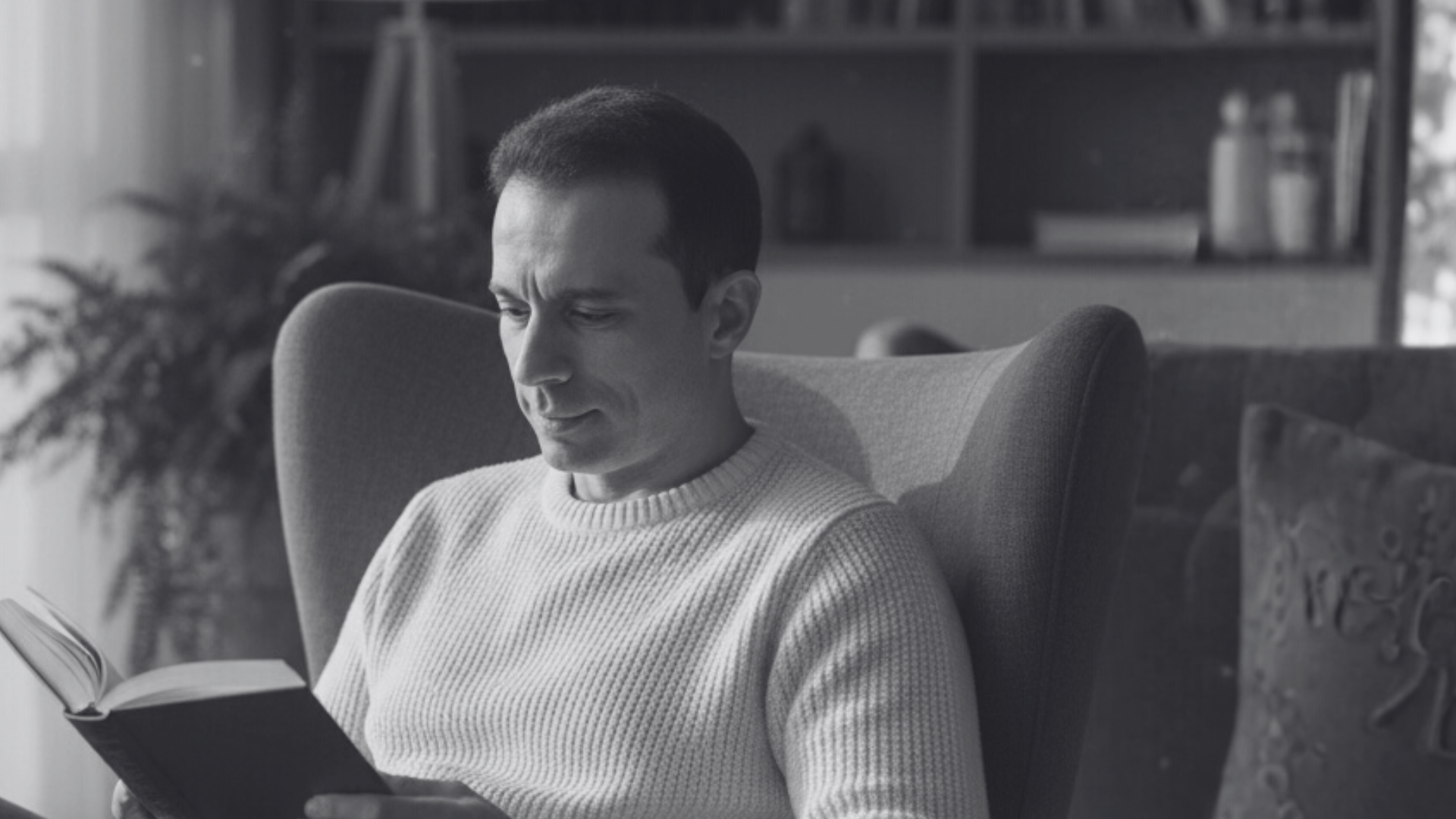 a black and white photo of a white wall