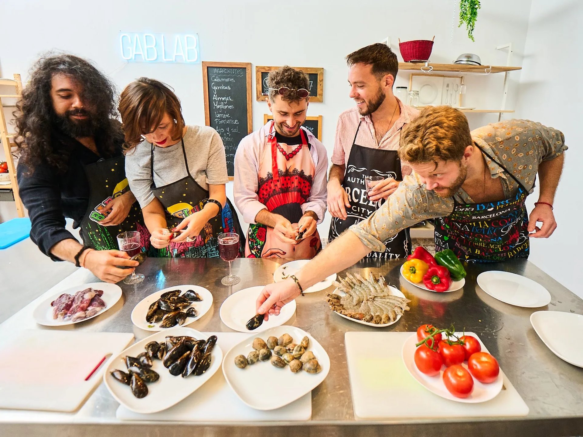 Guests joining a paella cooking class in Barcelona with a local chef