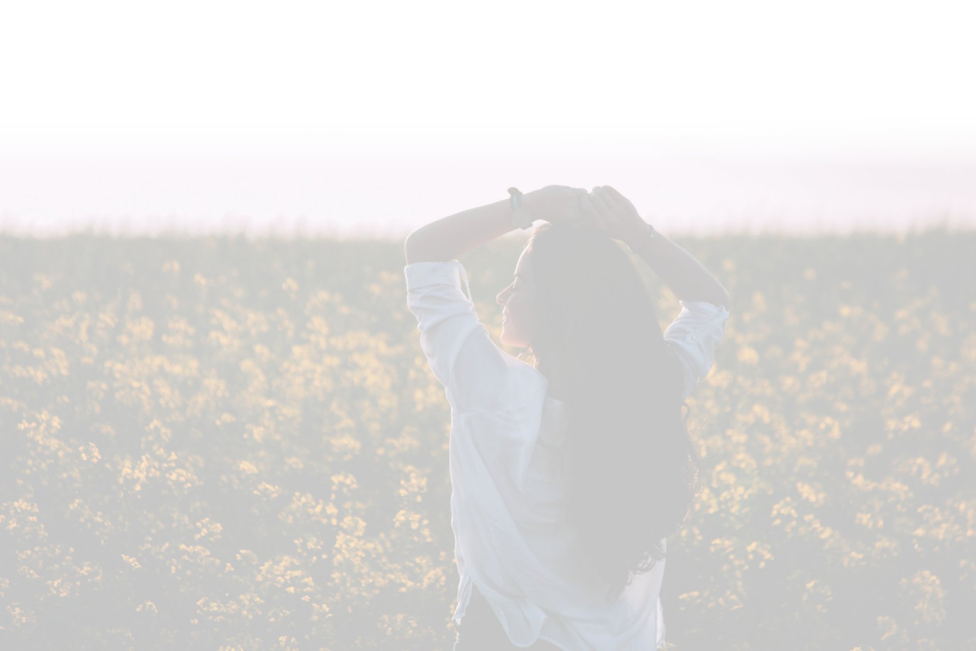 four person holding each others waist at daytime