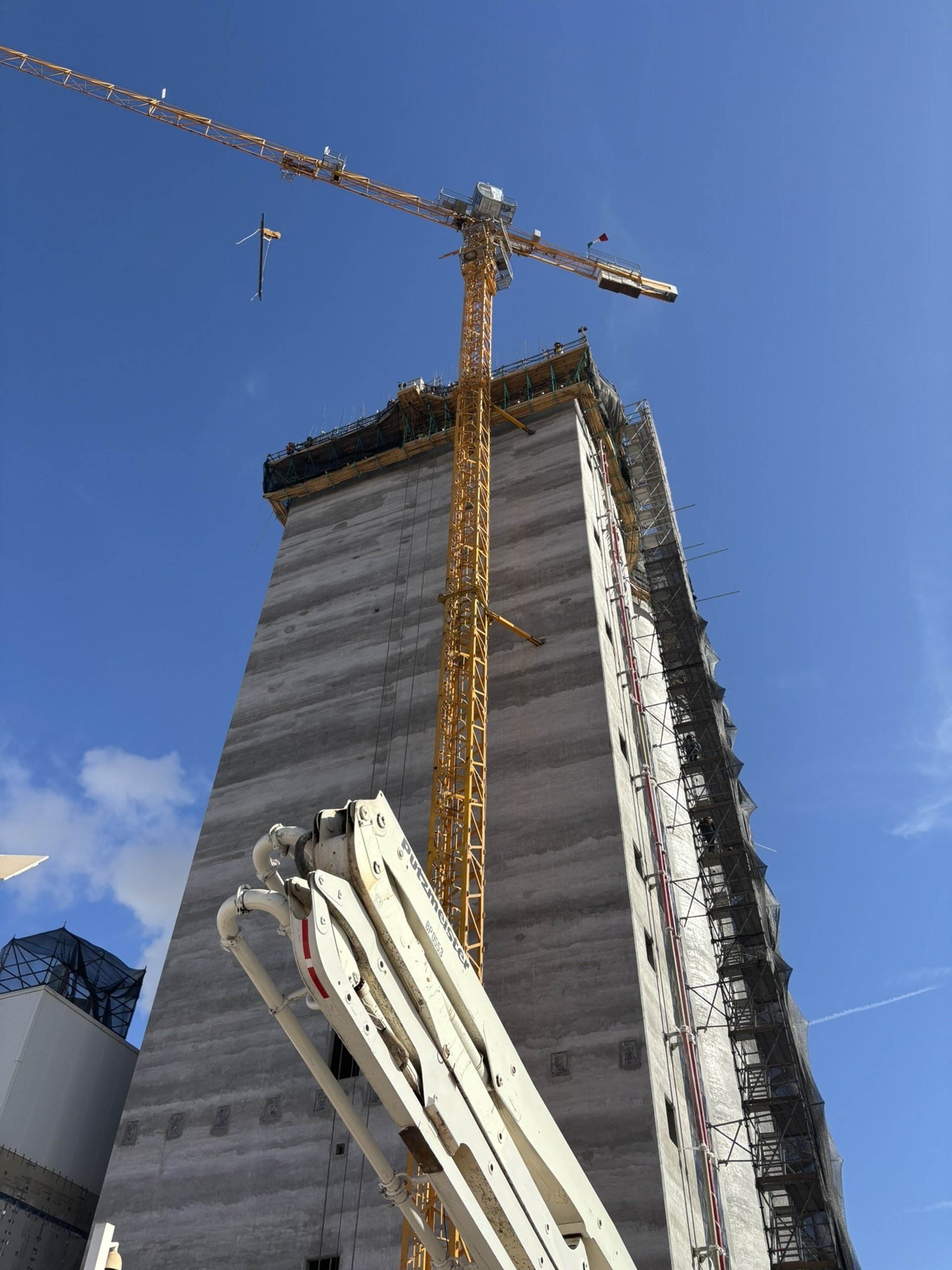 gray metal frame under white sky during daytime