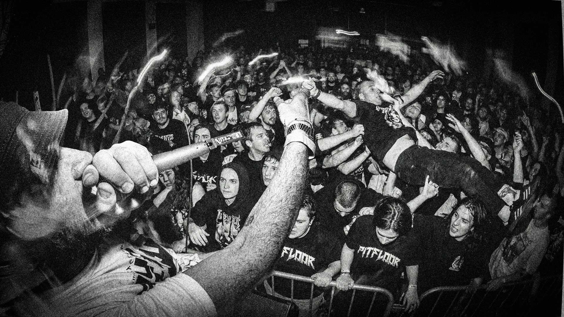 person wearing grey knit sweater