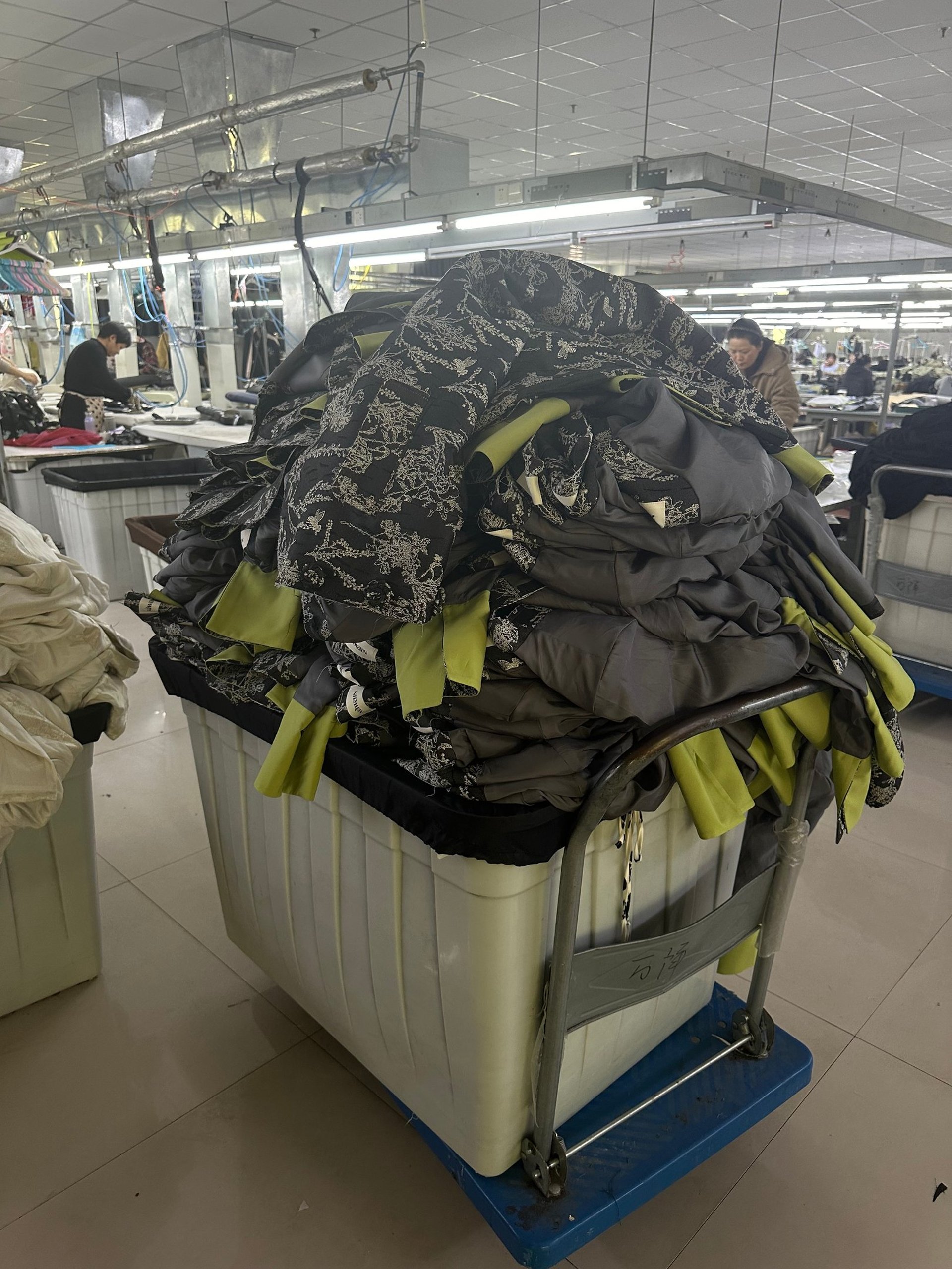 an abstract photo of a curved building with a blue sky in the background