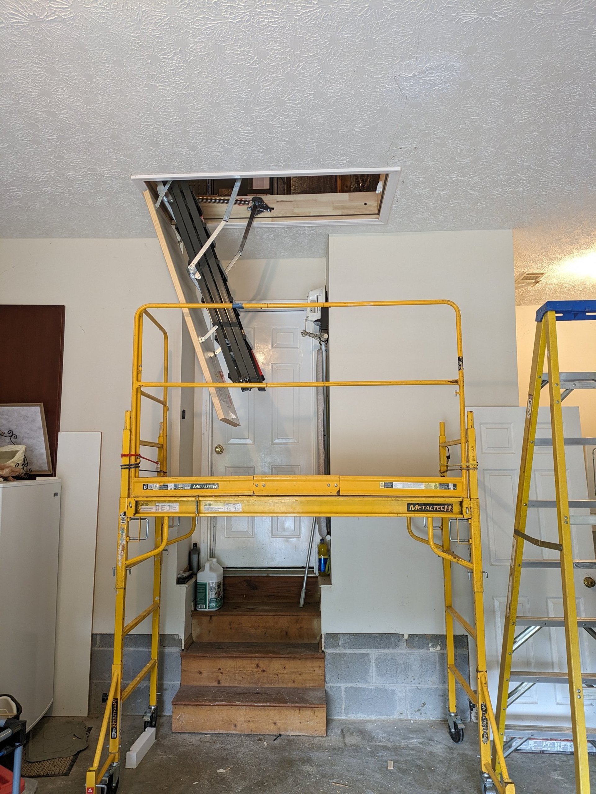 black and brown leather padded tub sofa